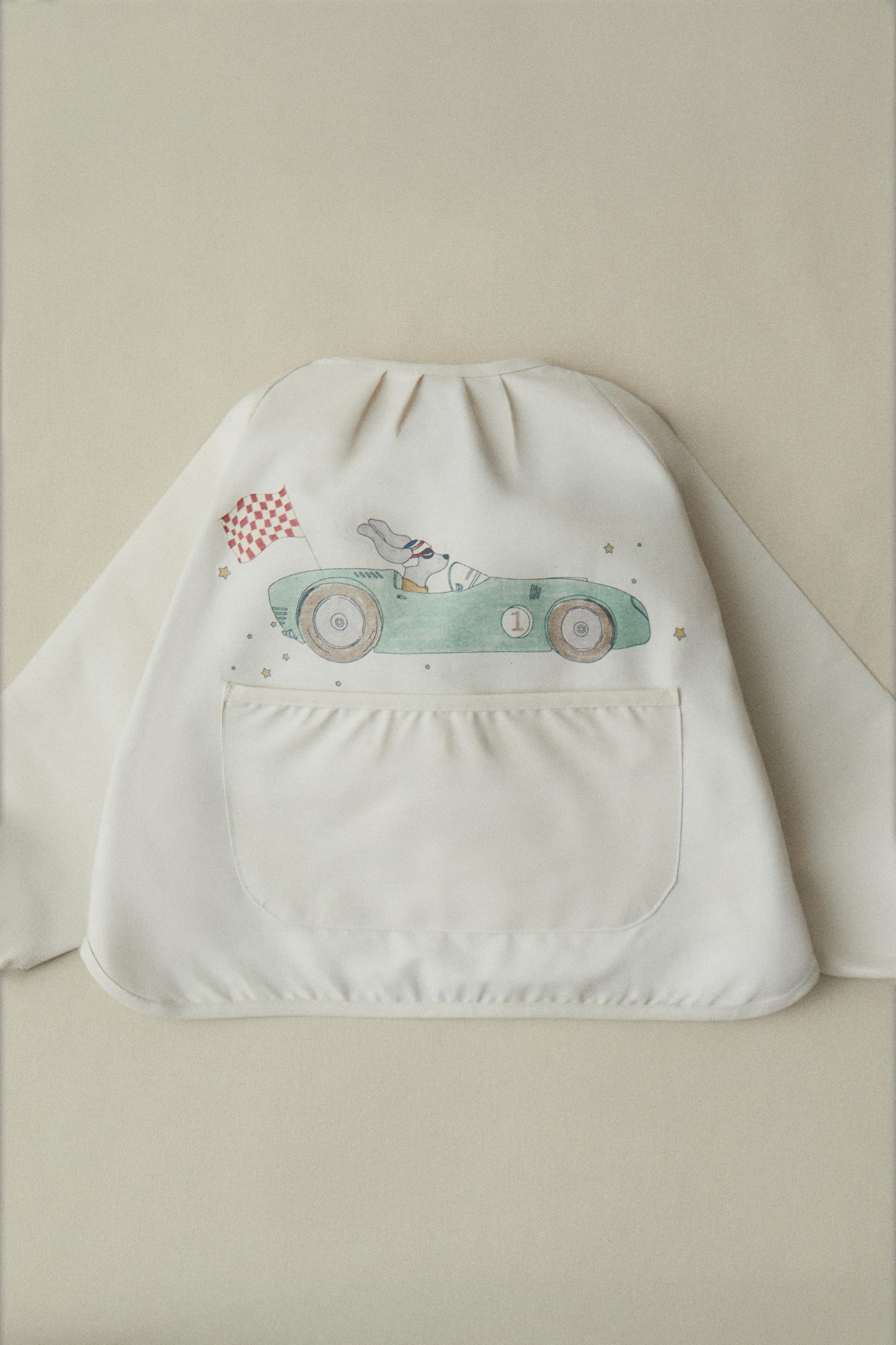 BABY BIB WITH SLEEVES AND RACING DOG