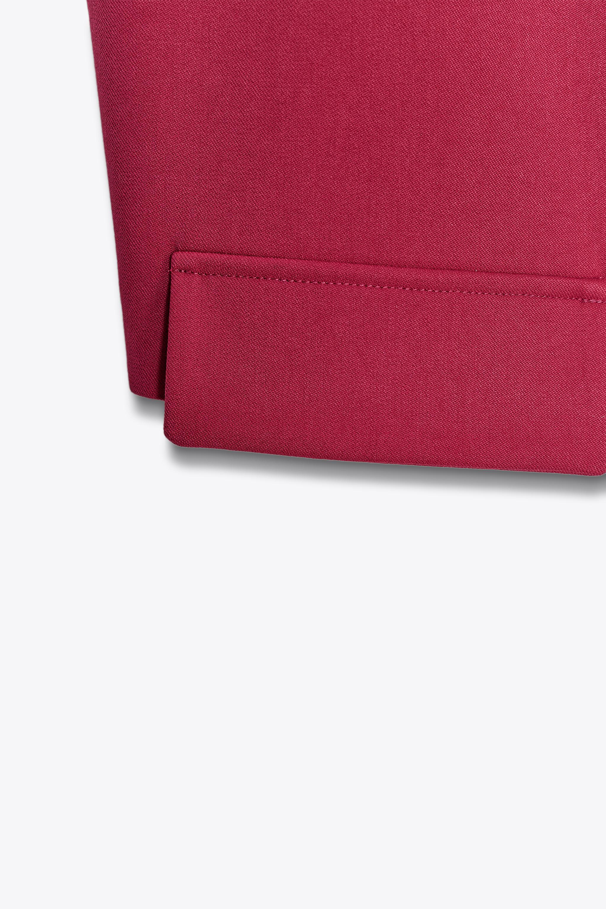 SHORT VEST WITH FLAPS