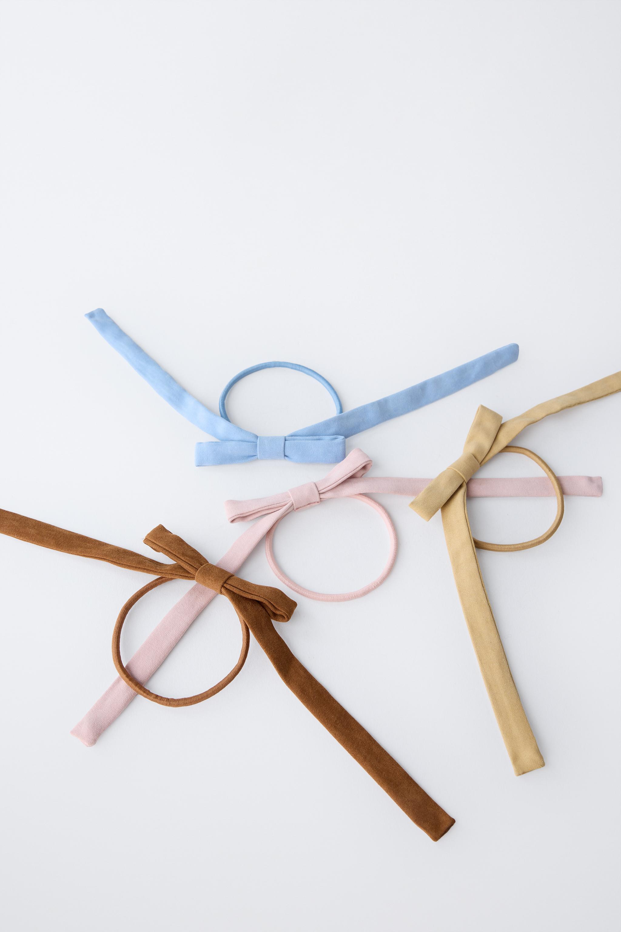 FOUR-PACK OF FAUX SUEDE BOW HAIR TIES