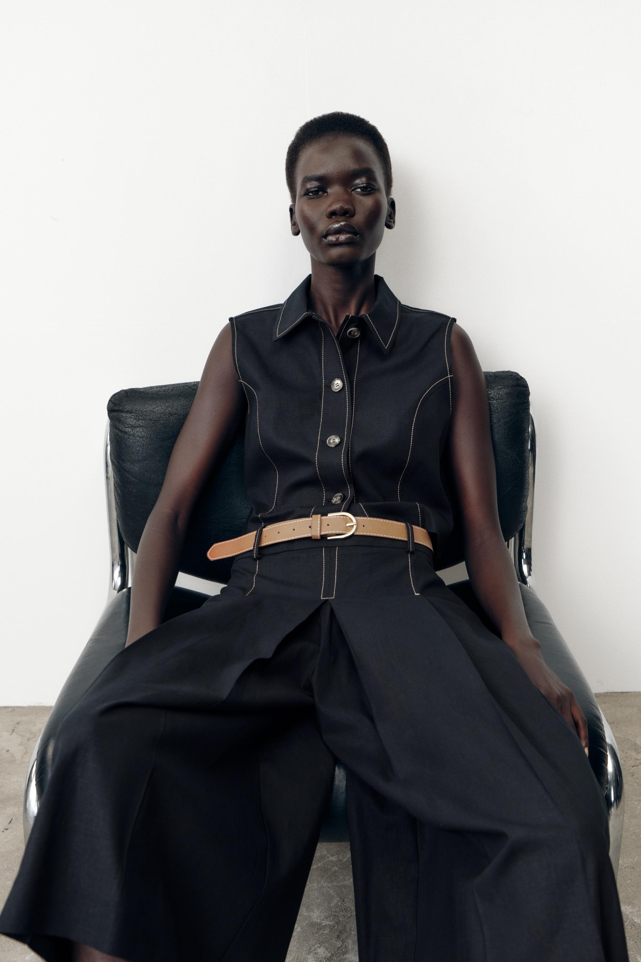 BELTED LONG PLEATED SHORTS