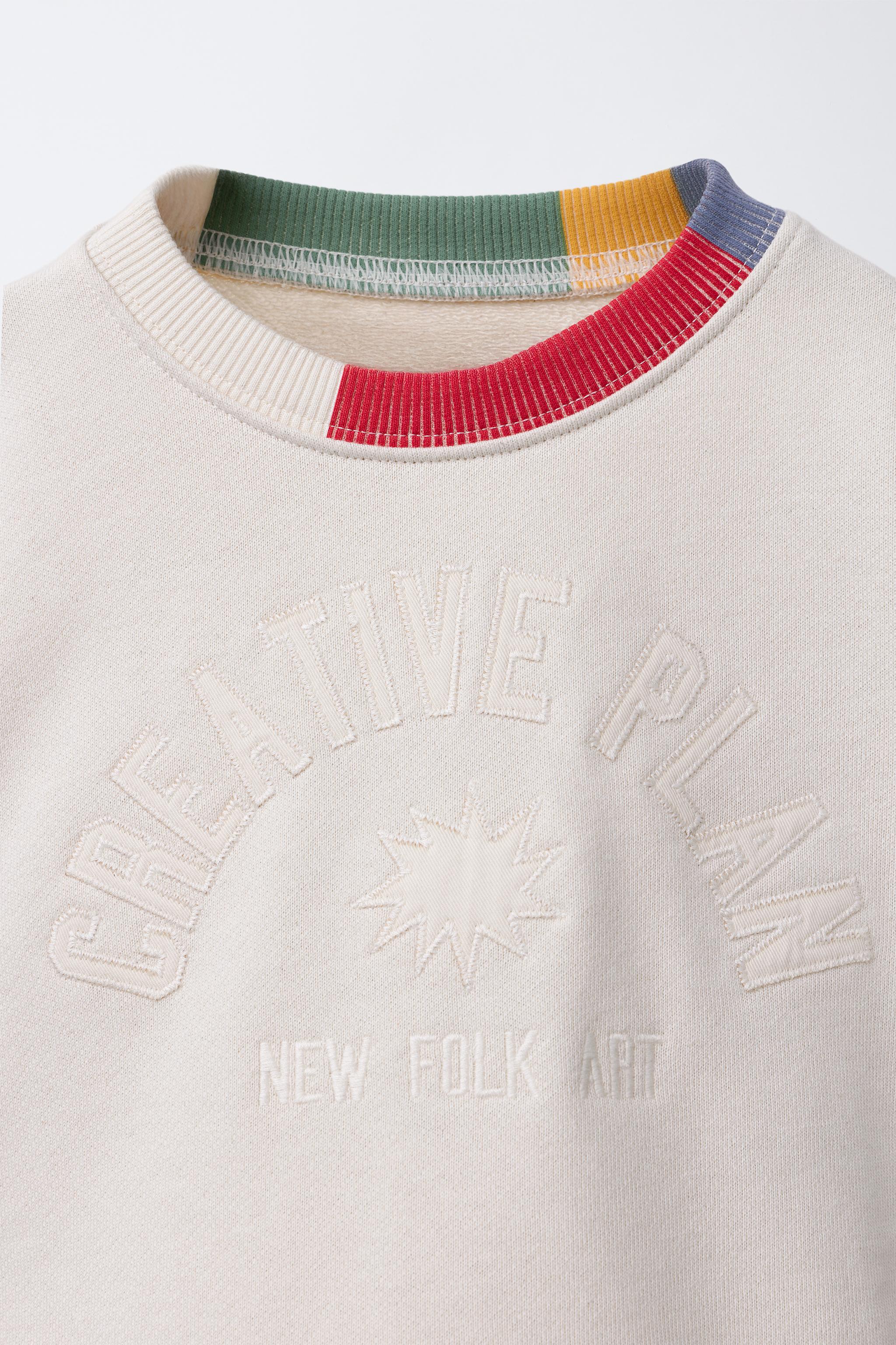 CONTRAST RIB EMBROIDERED TEXT SWEATSHIRT