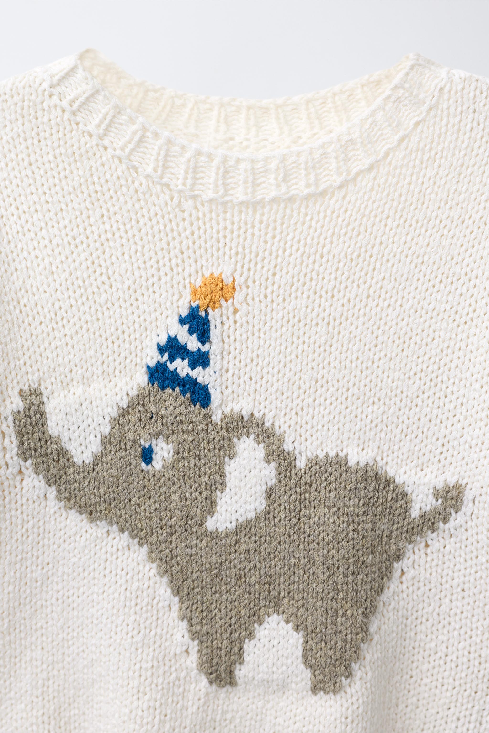 EMBROIDERED ELEPHANT KNIT SWEATER