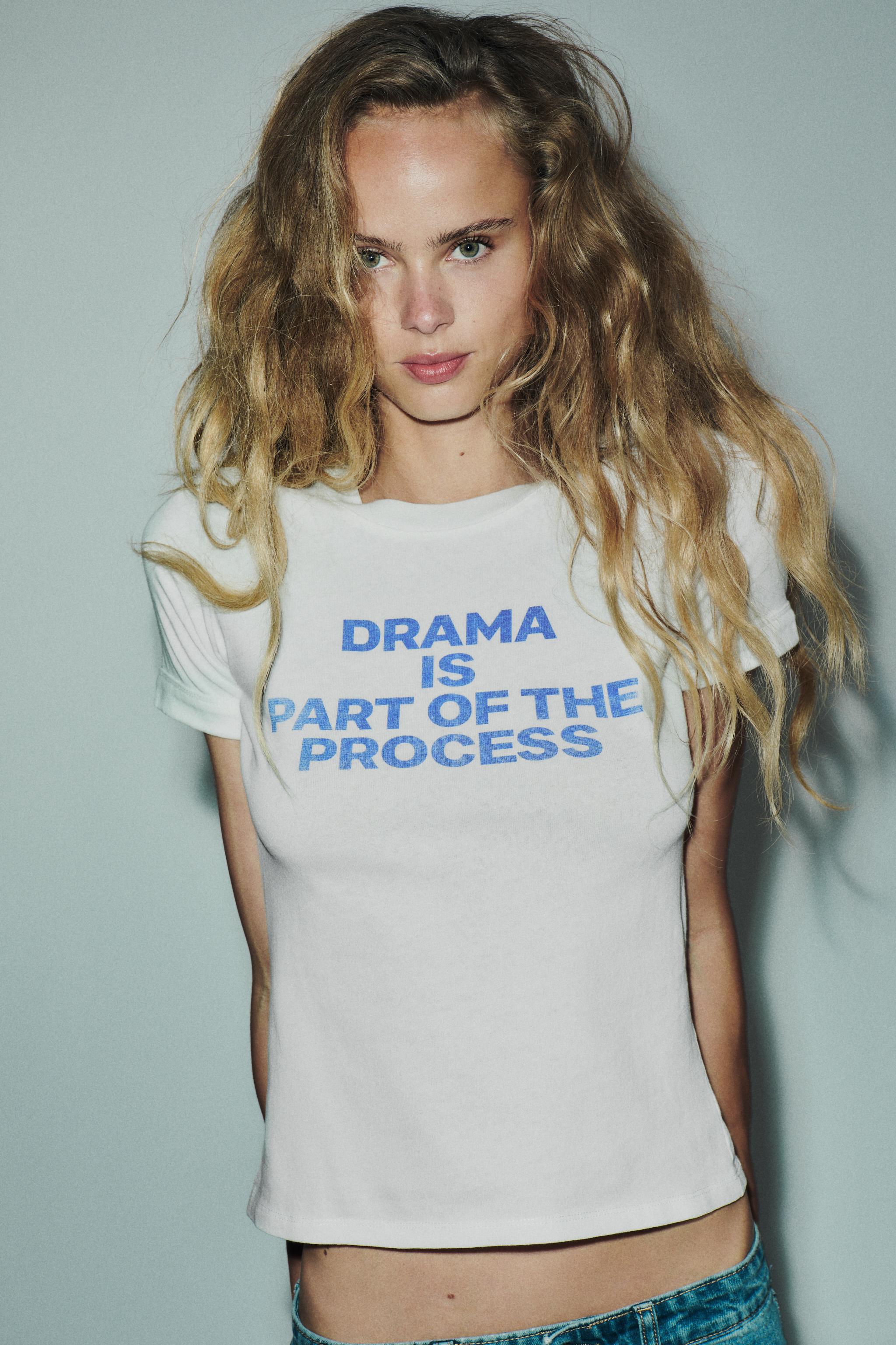 COTTON T-SHIRT WITH TEXT AND RIPS