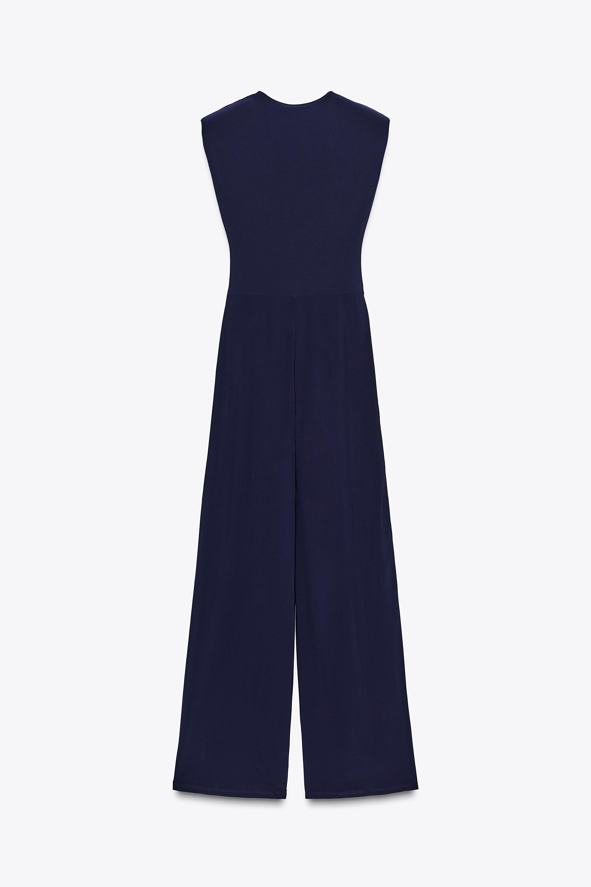 LONG DRAPED SHOULDER PAD JUMPSUIT