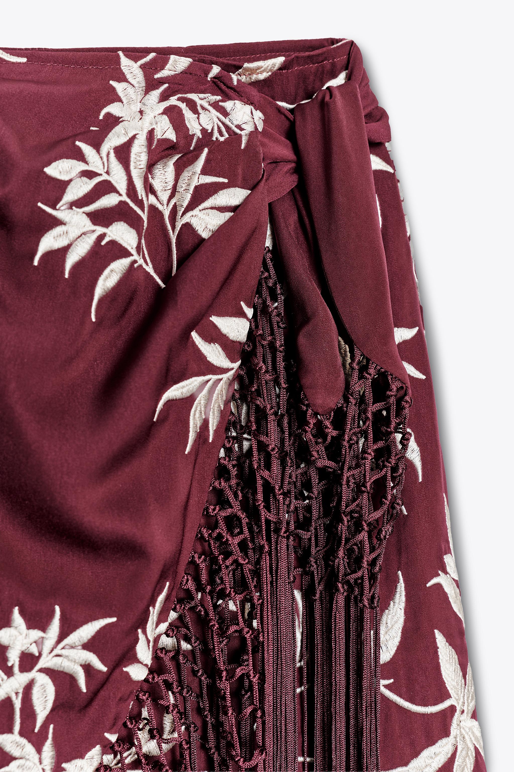EMBROIDERED FRINGED WRAP SKIRT