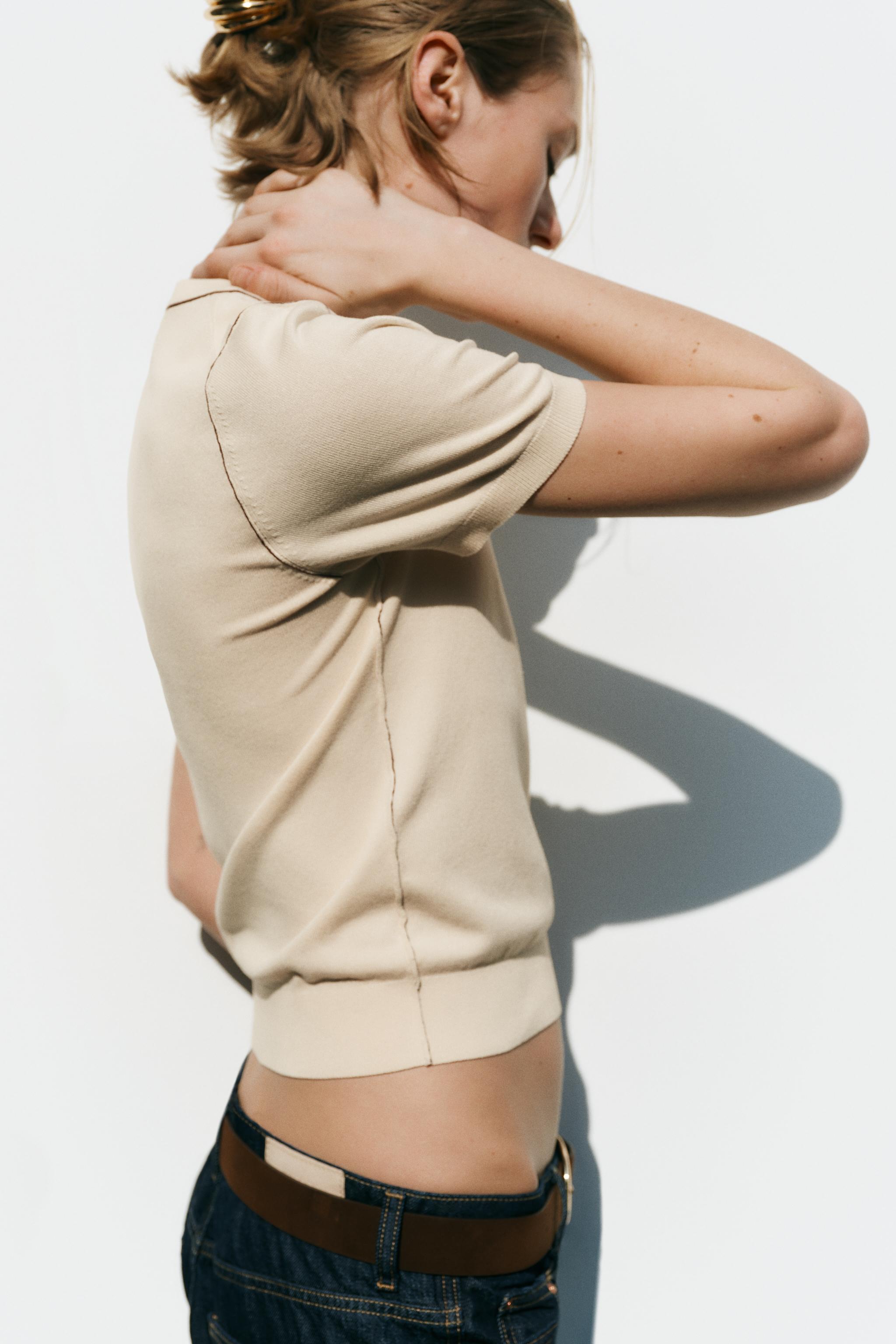 TRIMMED SHORT SLEEVE KNIT TOP