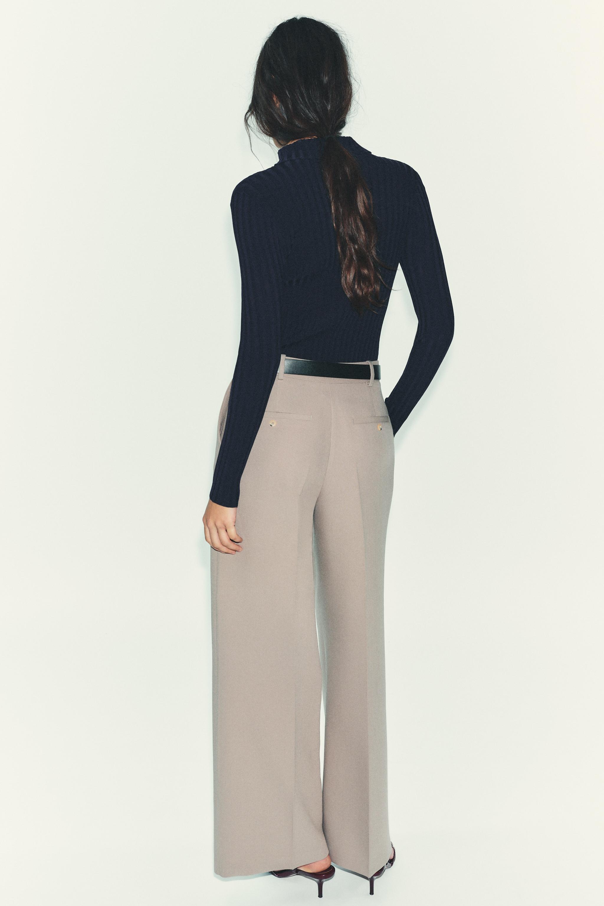 STRAIGHT LEG PLEATED BELTED PANTS