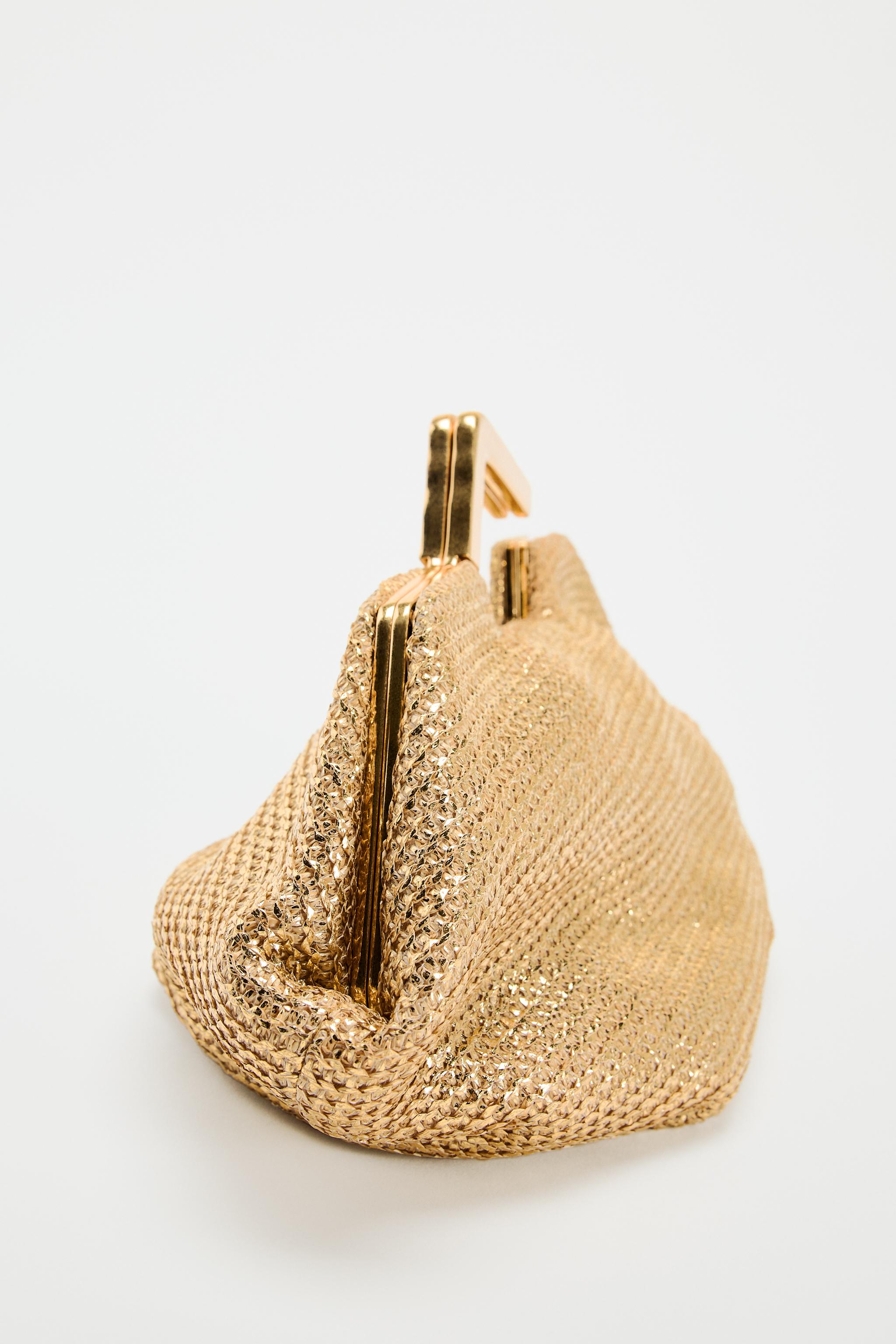 GOLD BAG WITH METAL HANDLE