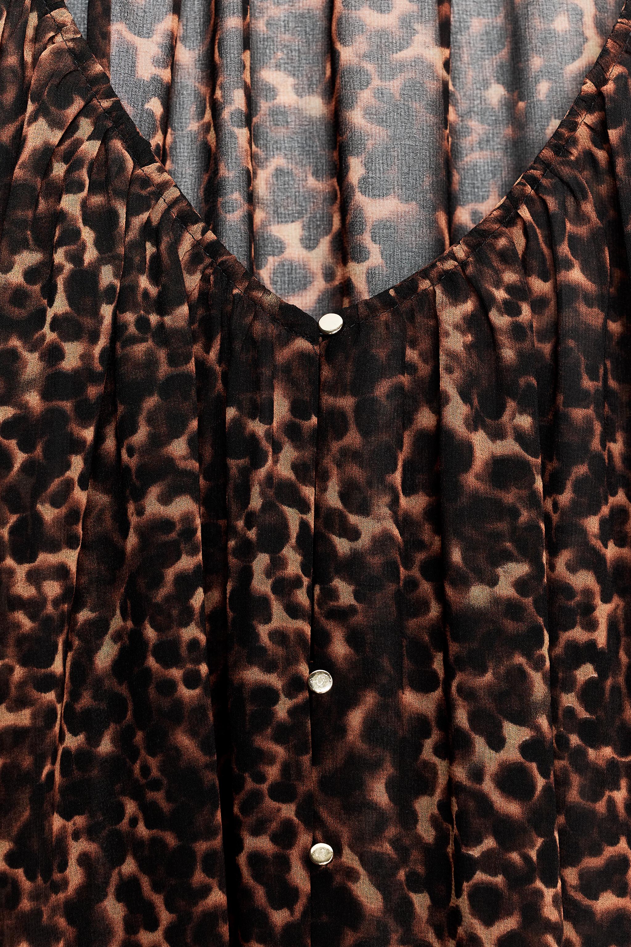 ANIMAL PRINT SEMI-SHEER BLOUSE