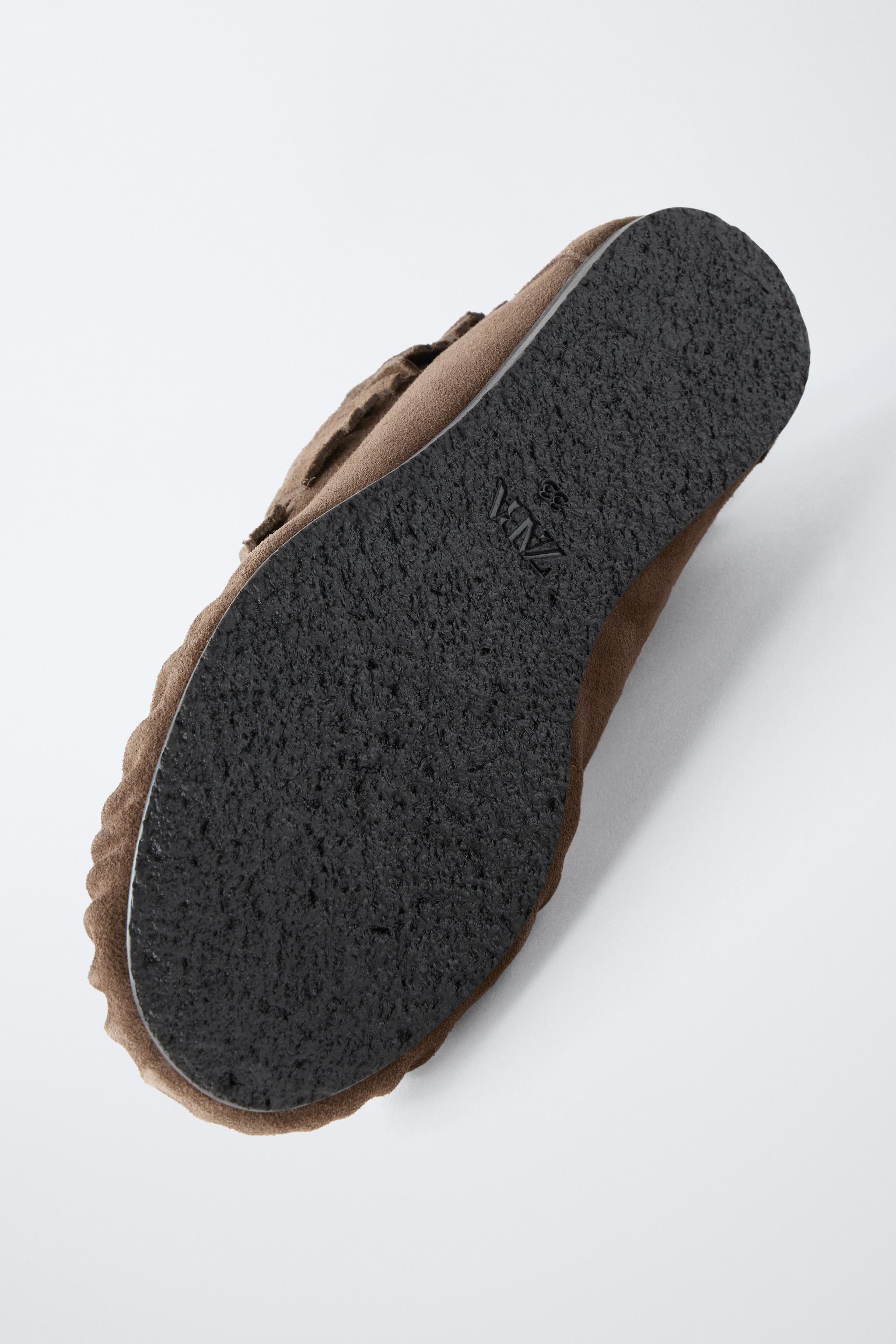 LOW-HEEL LEATHER FRINGED ANKLE BOOTS