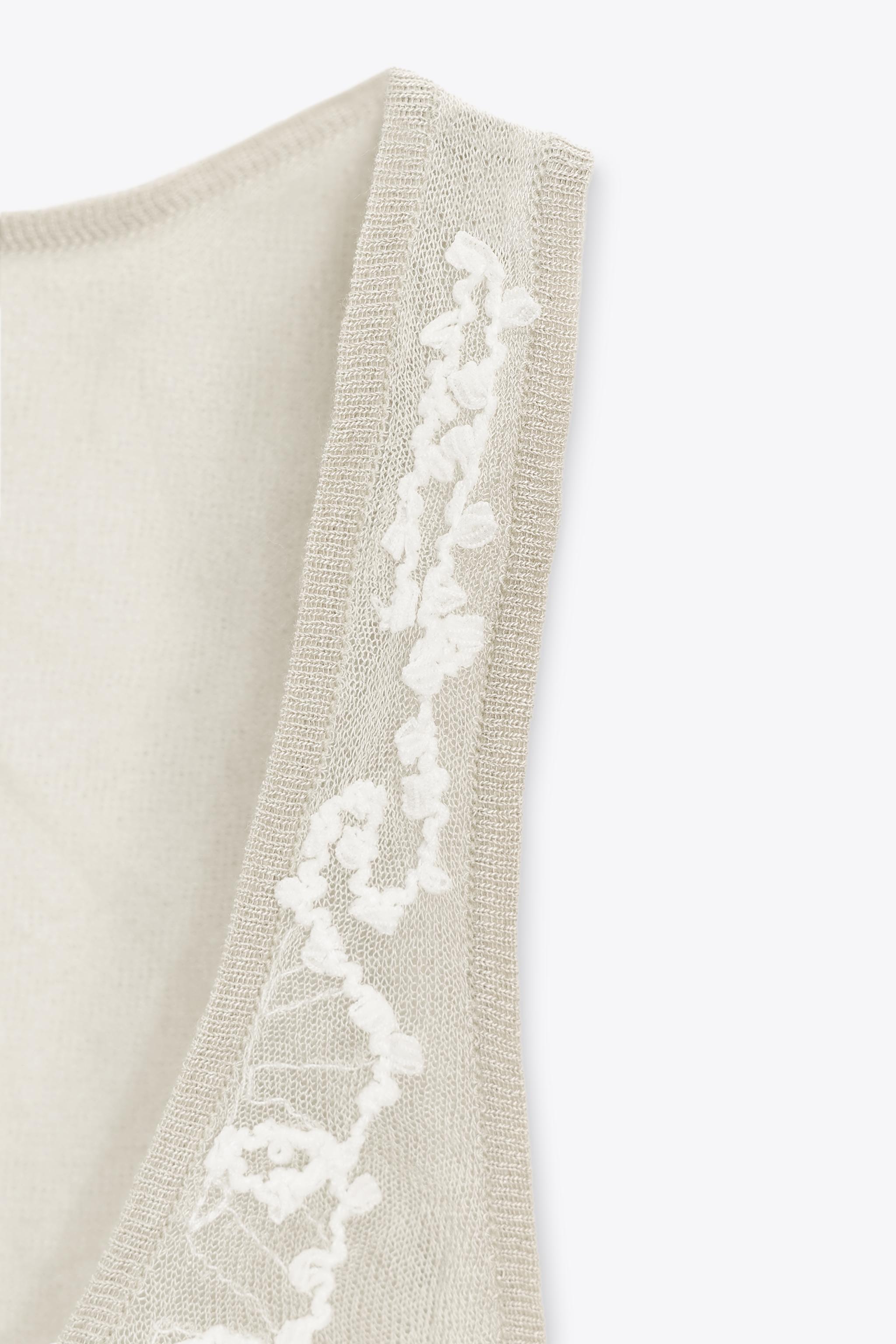 SEMI-SHEER STRUCTURED KNIT TOP