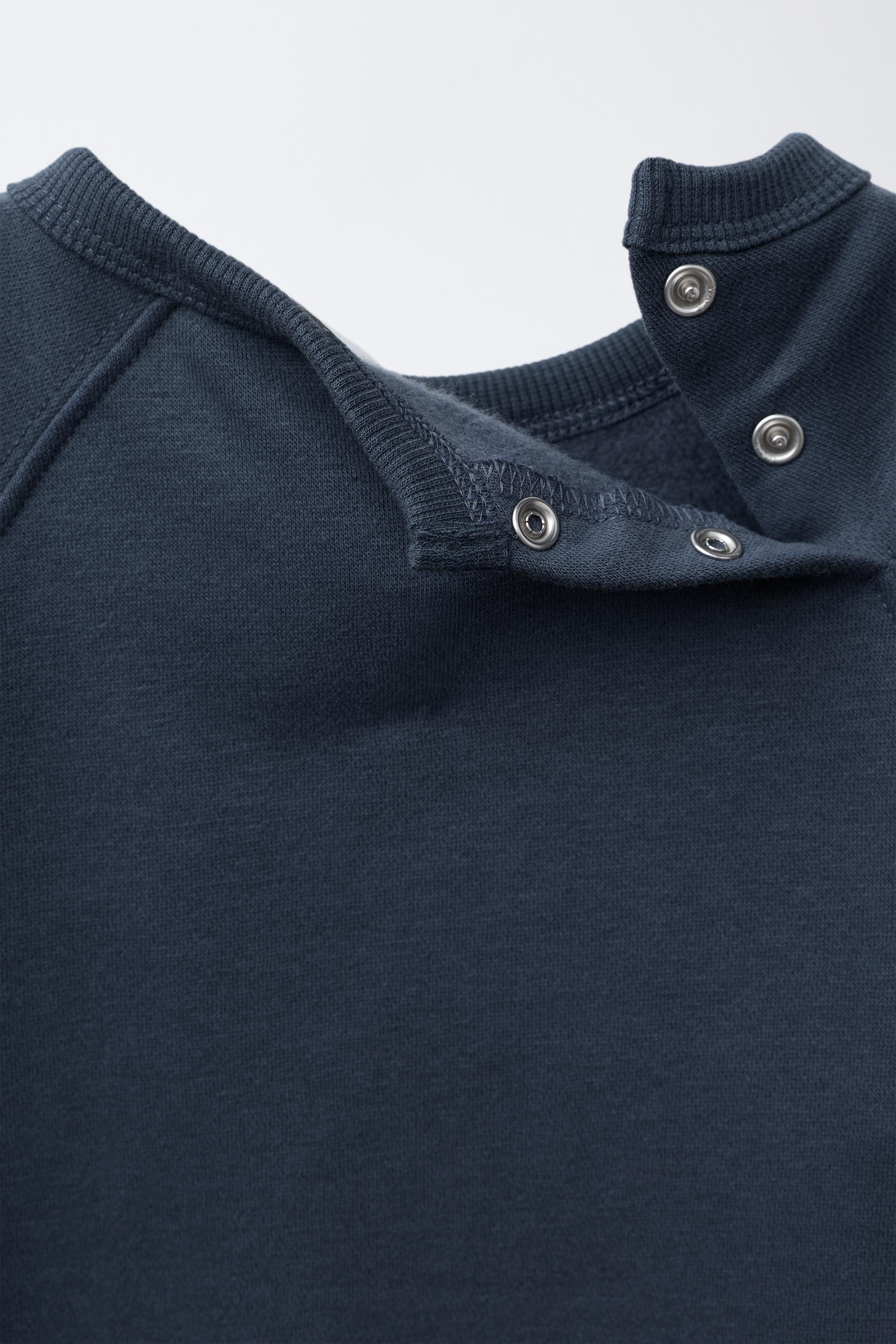 EMBROIDERED PUPPY PLUSH JUMPSUIT