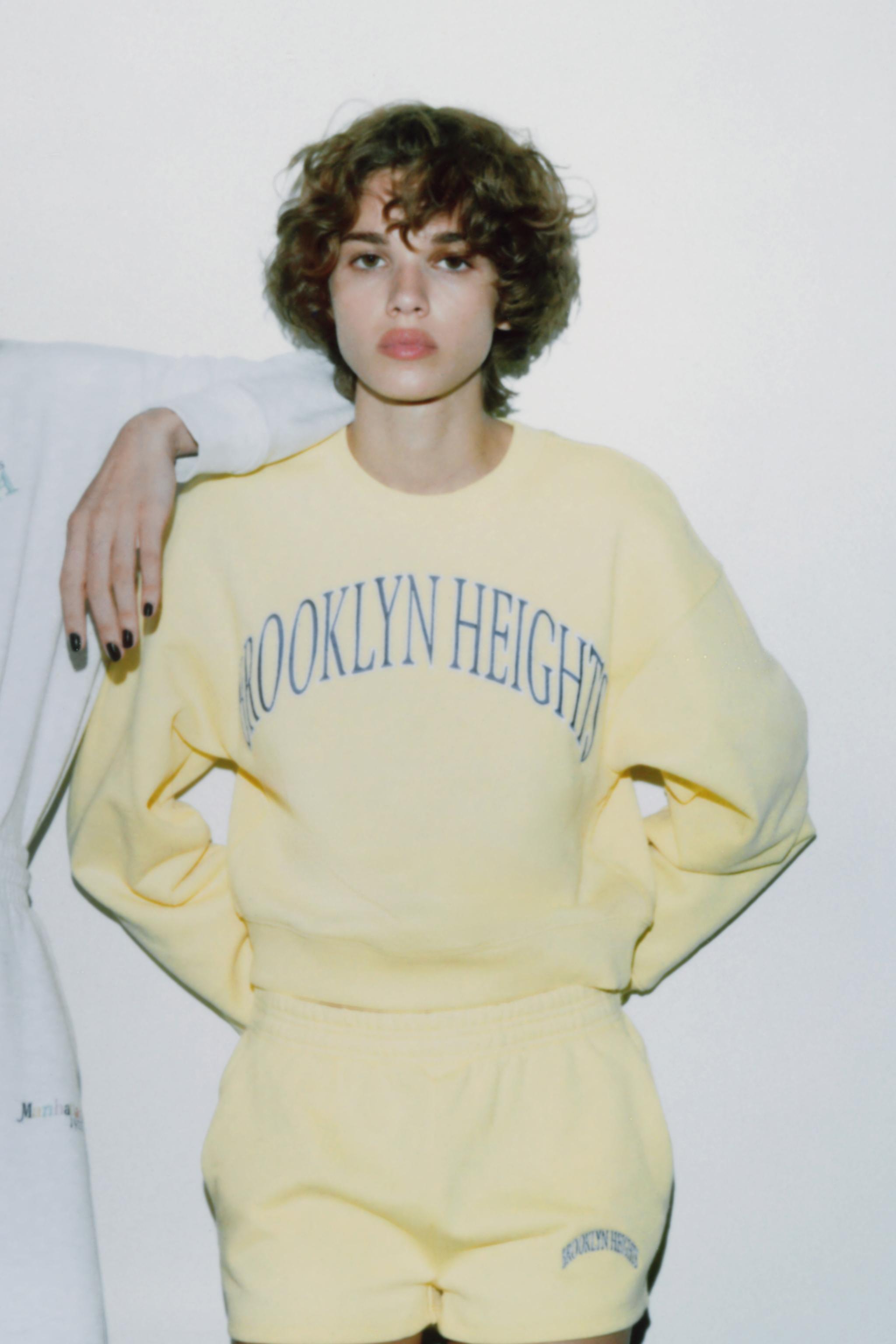 EMBROIDERED TEXT PLUSH SWEATSHIRT