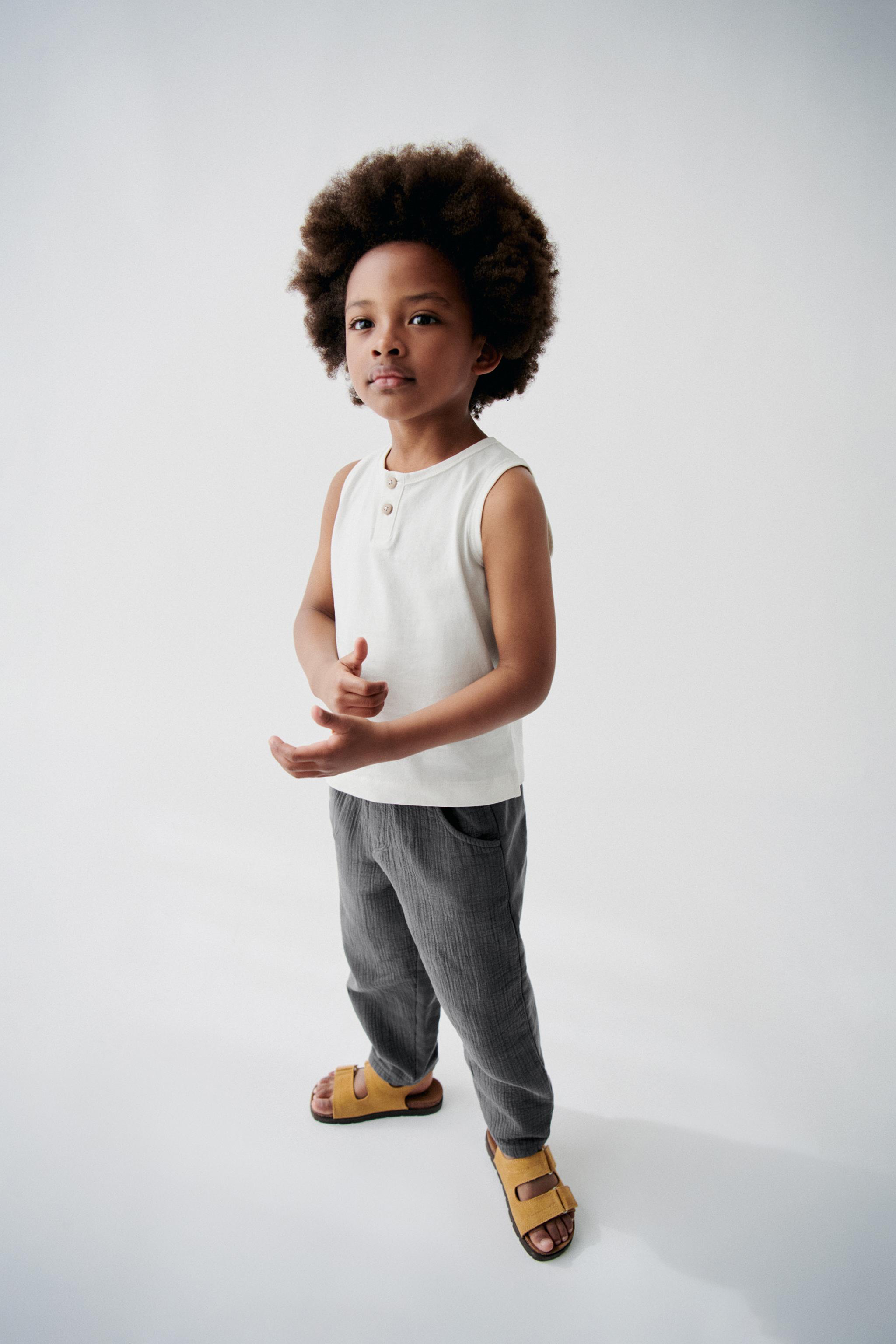 SLEEVELESS TOP WITH BUTTONS