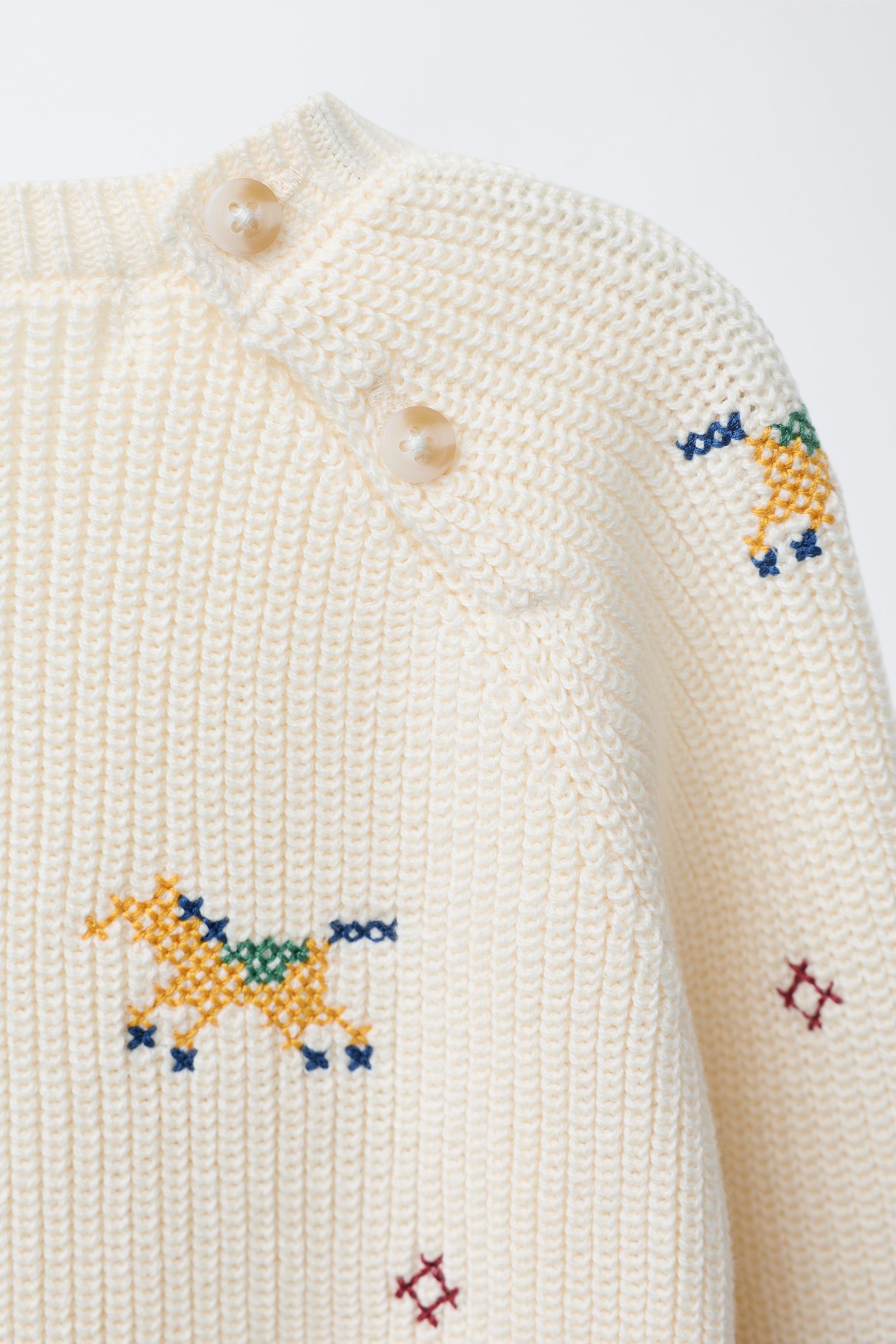 KNIT SWEATER WITH CROSS STITCH DETAILS