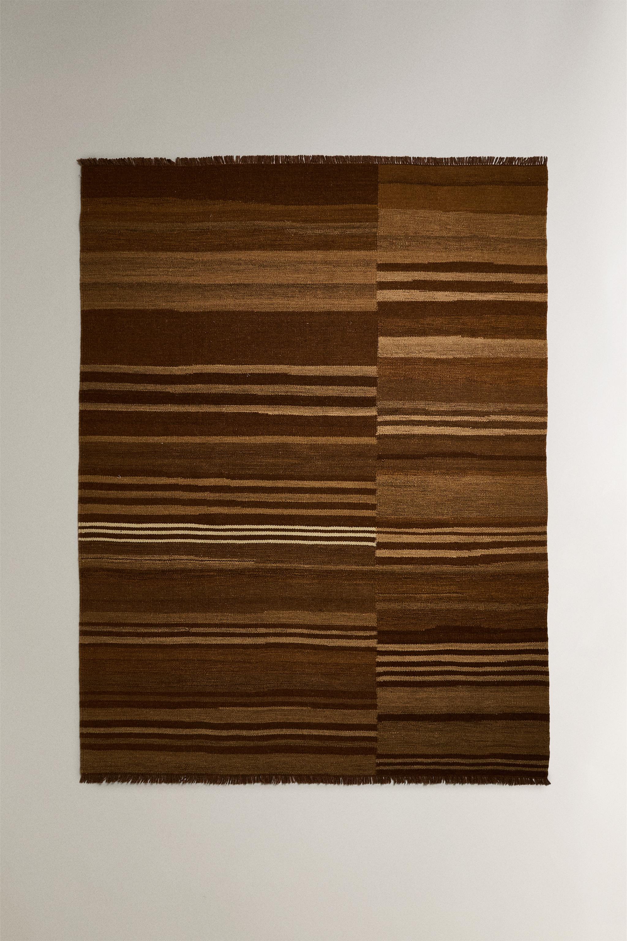 STRIPED AREA RUG WITH FRINGING