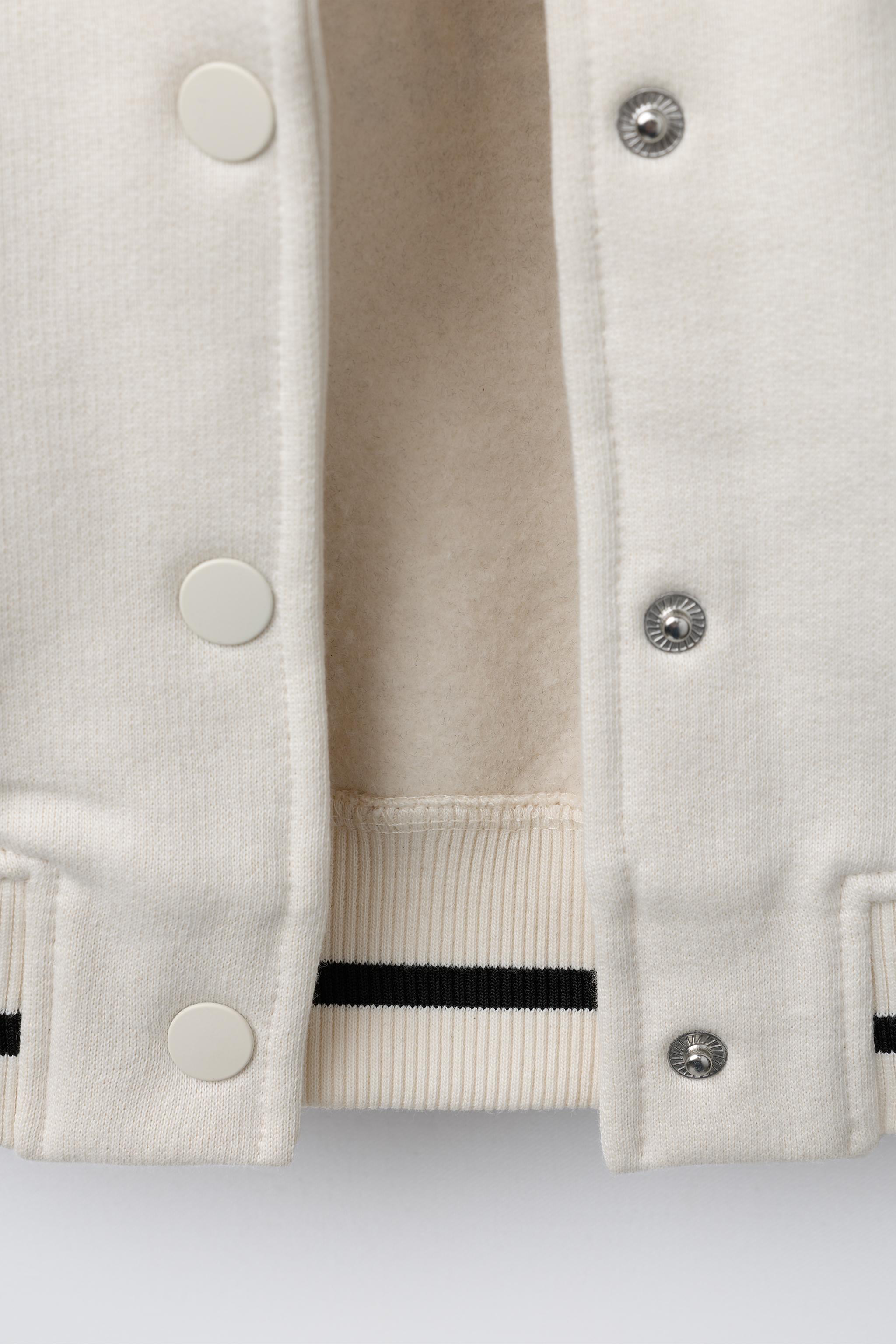 PLUSH BOMBER JACKET WITH EMBROIDERED TEXT