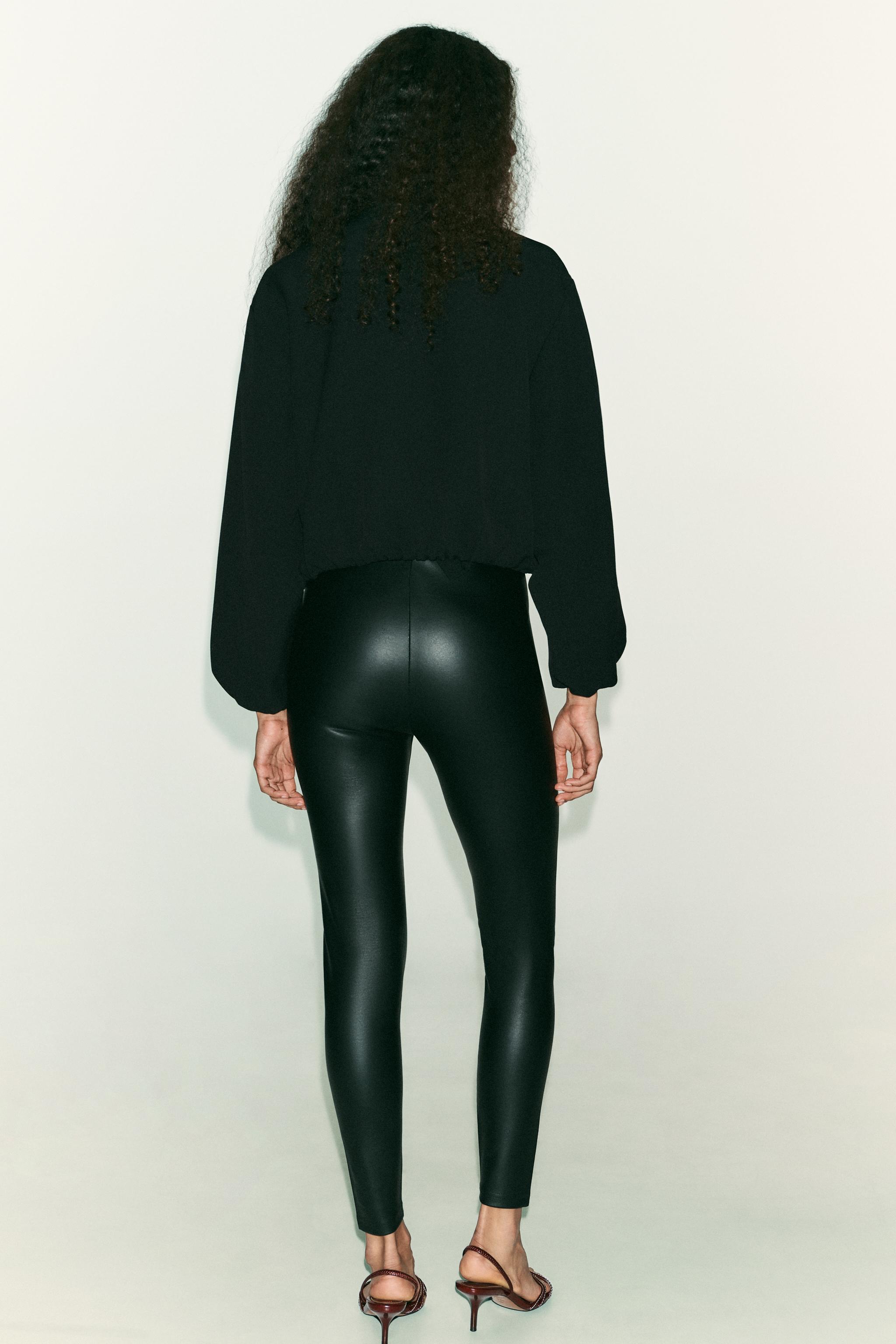 MID-RISE FAUX LEATHER EFFECT LEGGINGS
