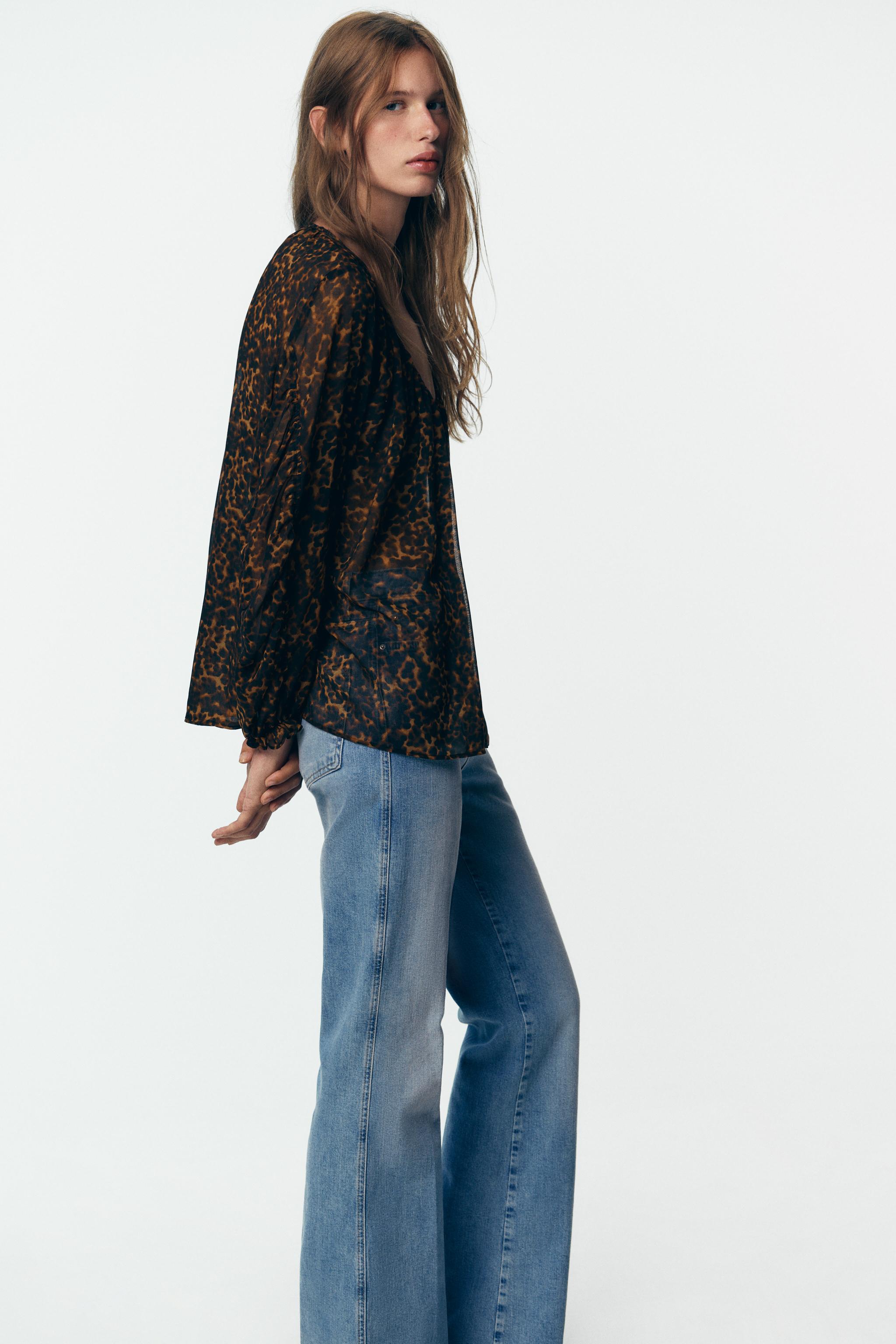 ANIMAL PRINT SEMI-SHEER BLOUSE