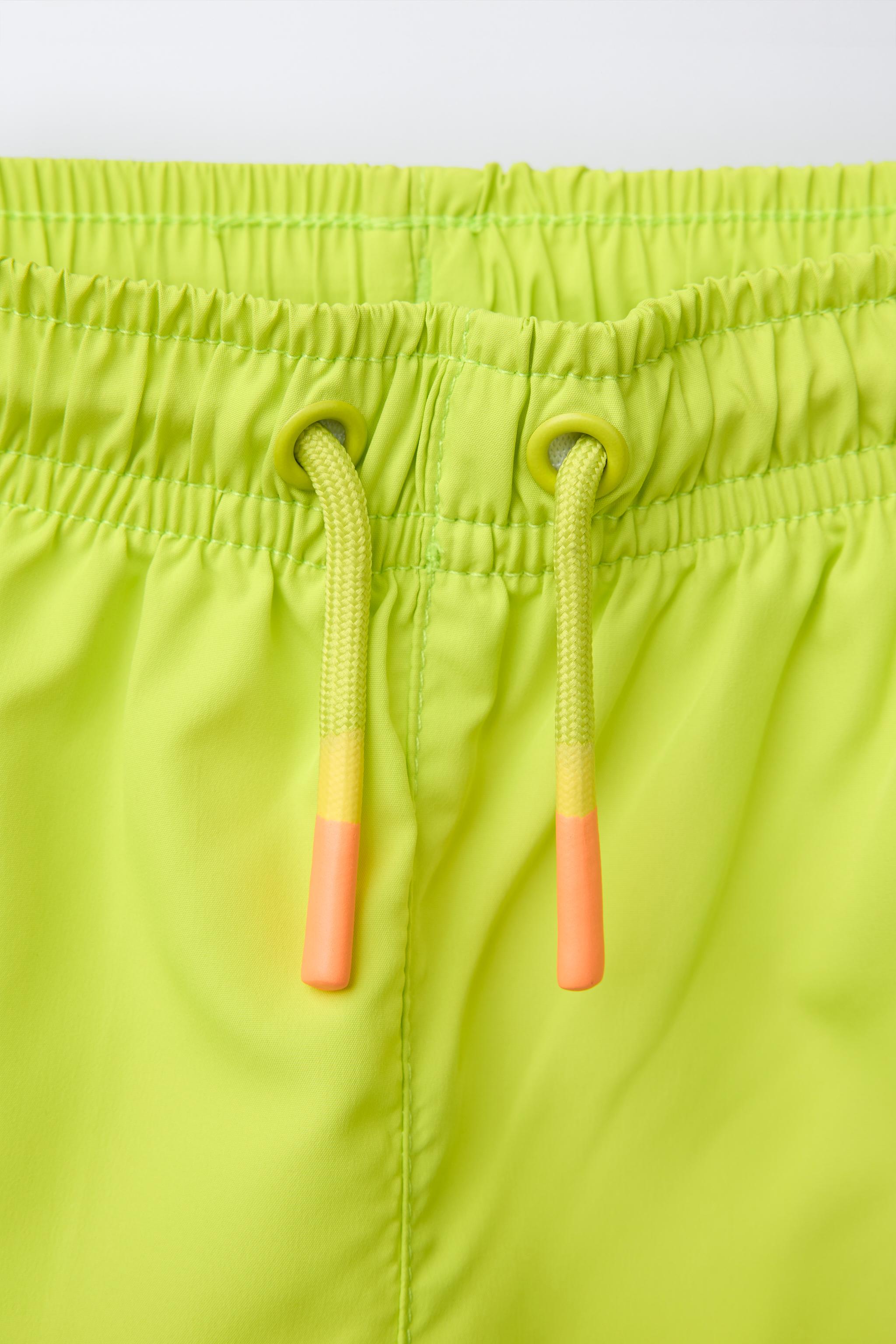 6-14 YEARS/ PALM TREE SWIM SHORTS