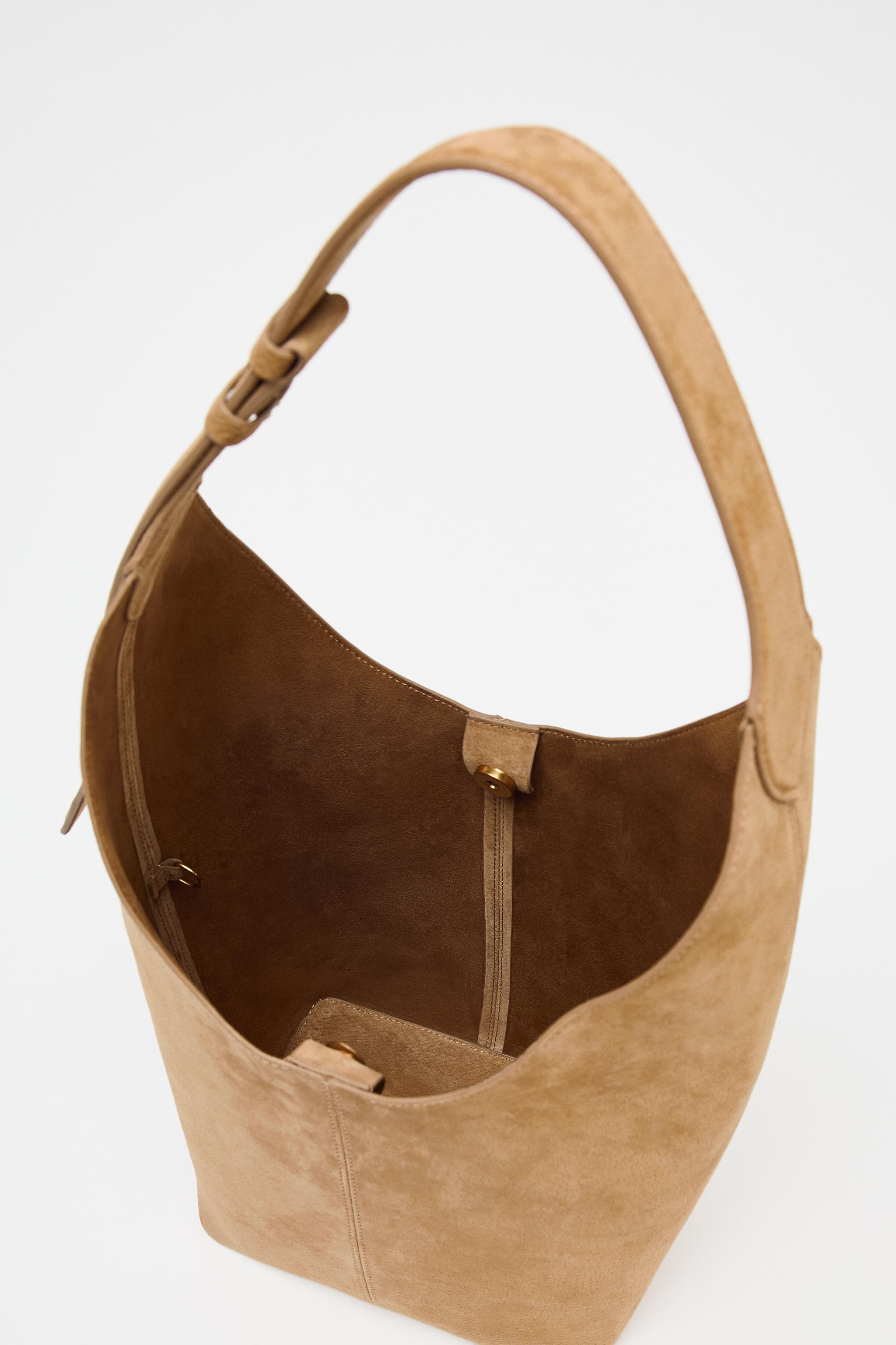 LEATHER MAXI BUCKET BAG WITH HANDLE DETAIL