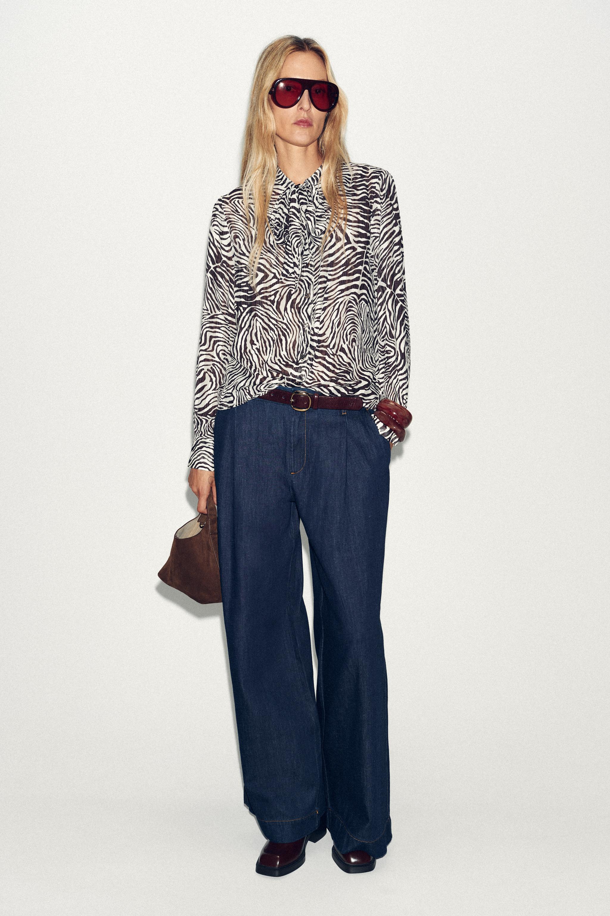 ANIMAL PRINT BOW BLOUSE