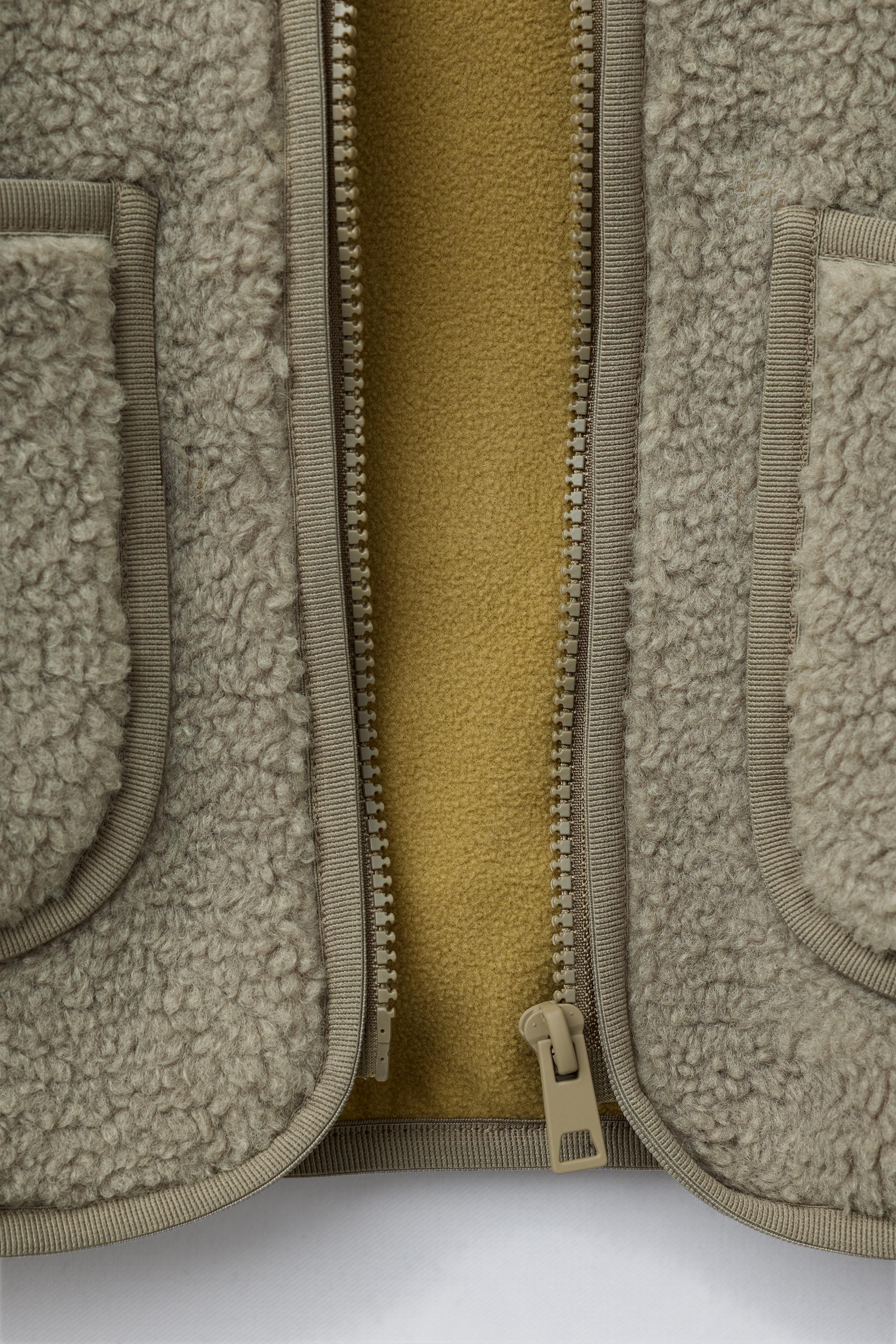 SNOOPY PEANUTS™ SHEARLING VEST