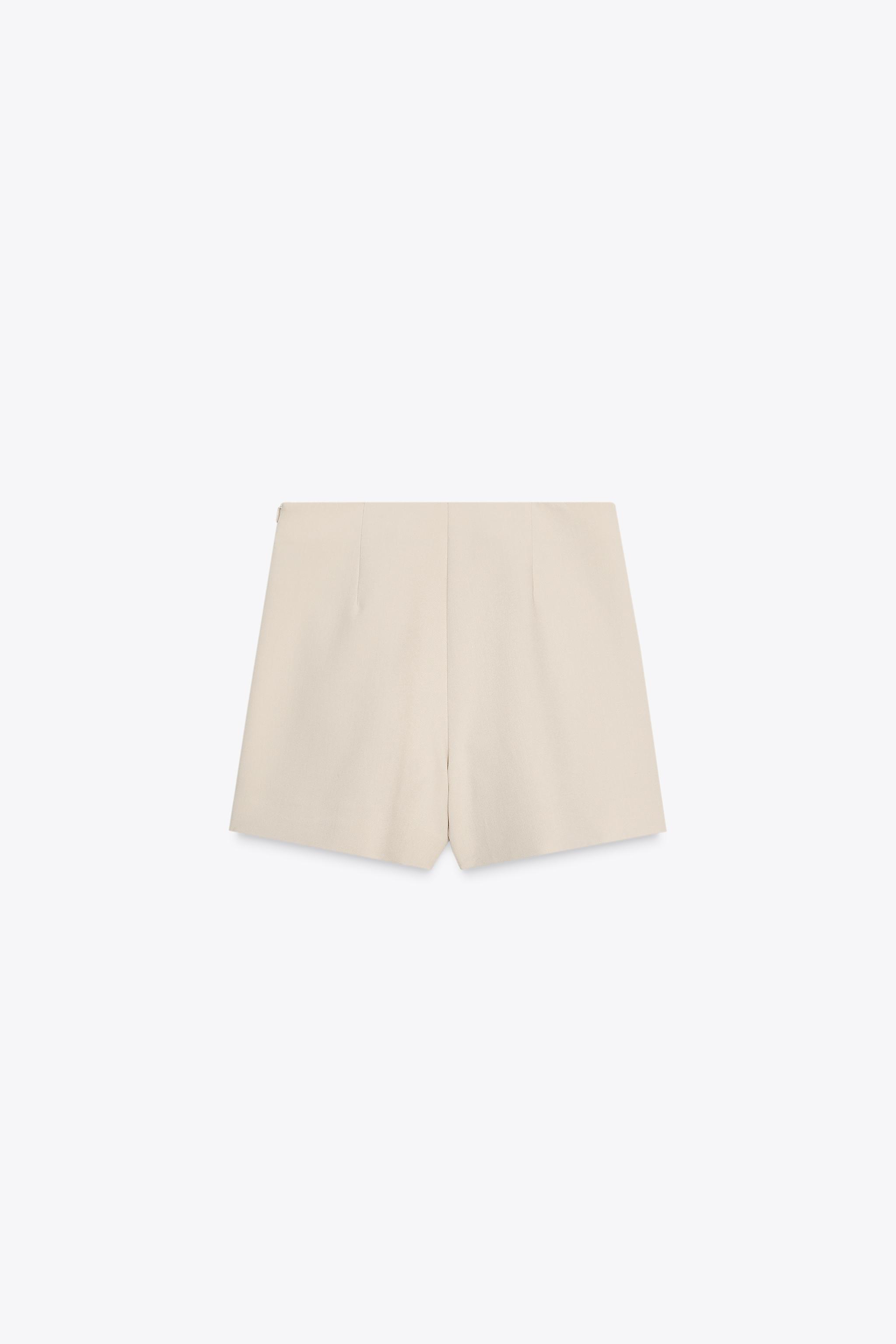ASYMMETRICAL CULOTTE SKIRT WITH APPLIQUE