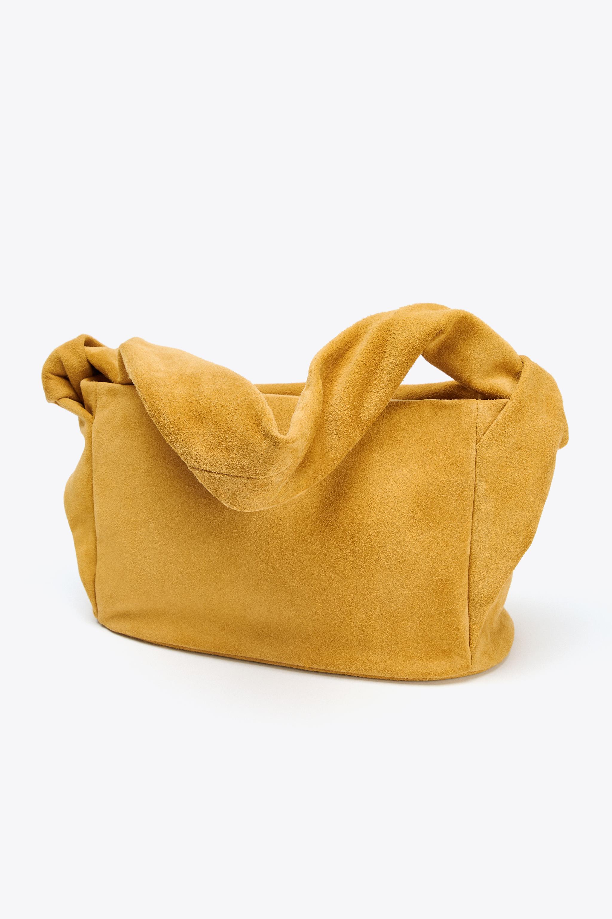 SPLIT LEATHER HANDBAG