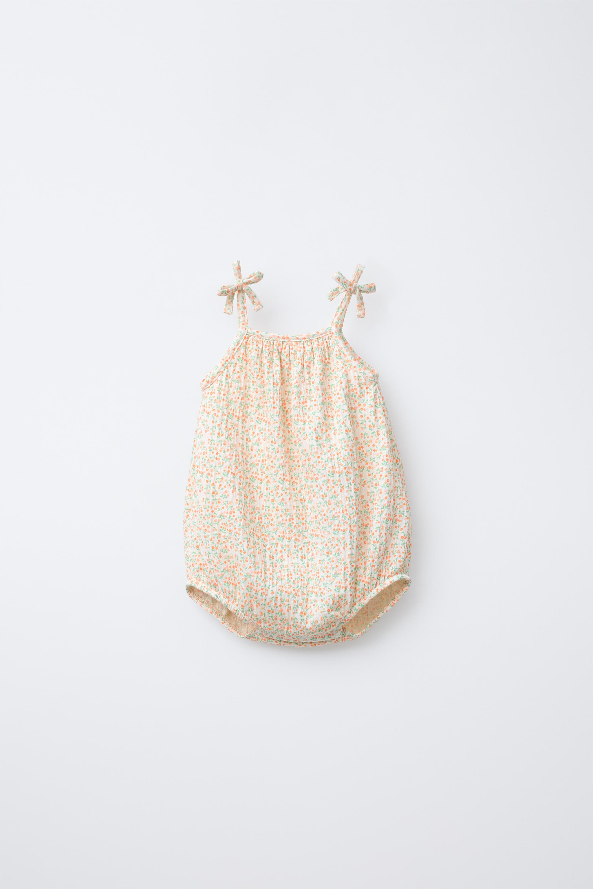 TEXTURED FLORAL BODYSUIT