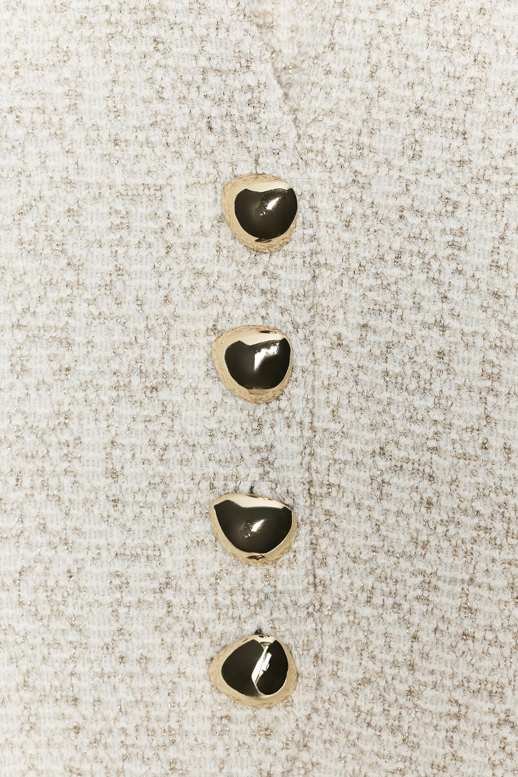 TEXTURED BUTTON VEST