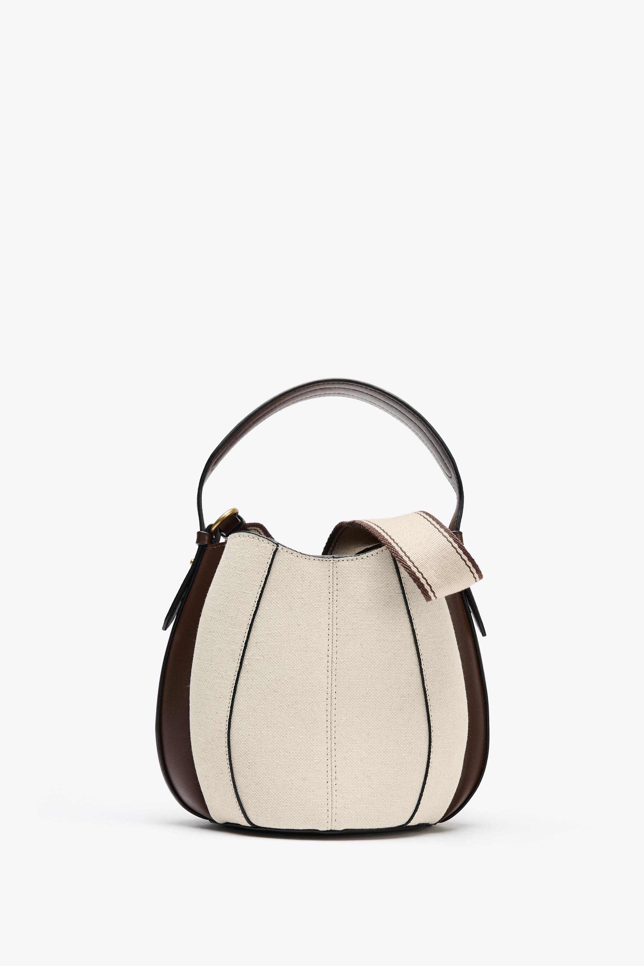 TOPSTITCHED BUCKET BAG
