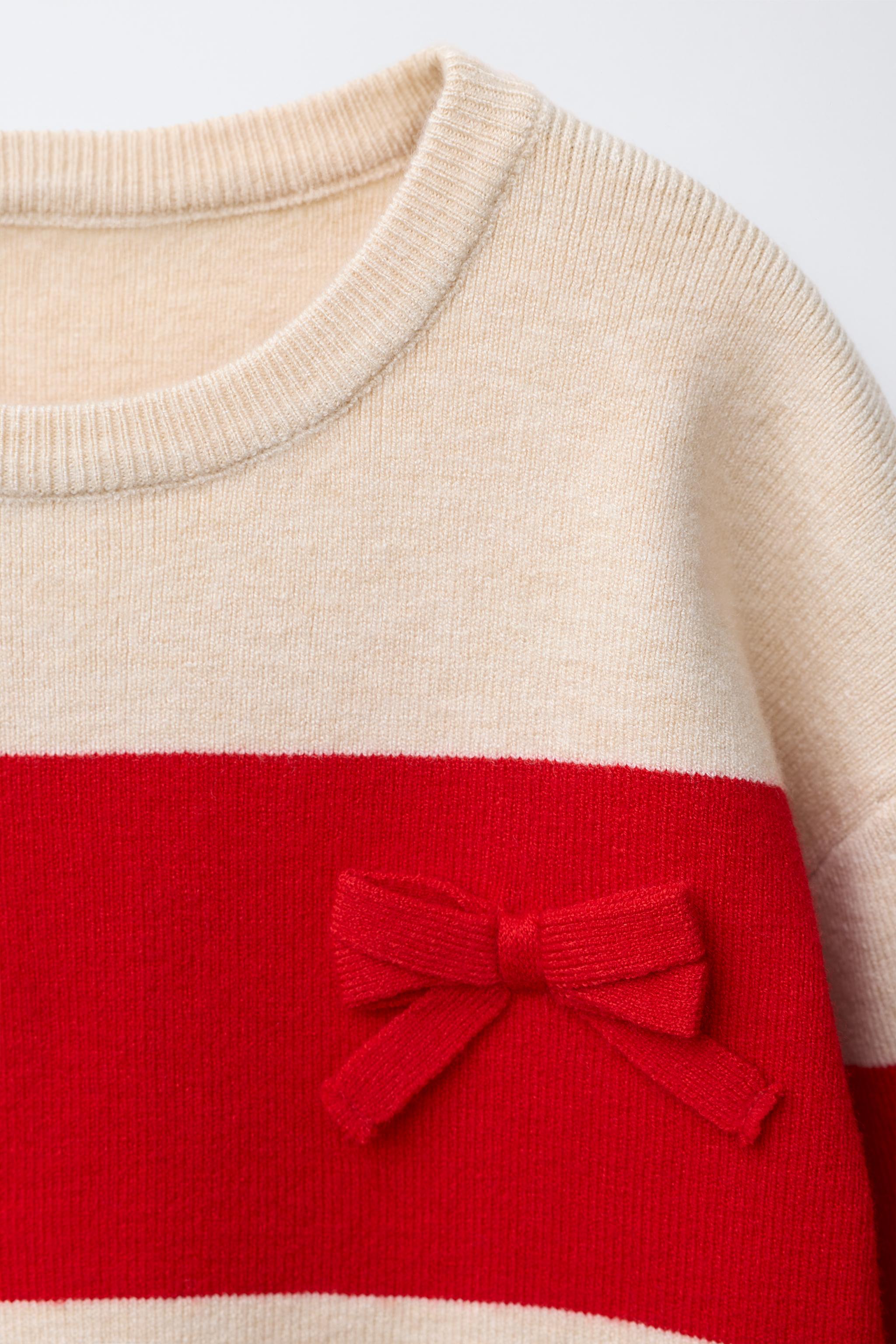 STRIPED KNIT SWEATER WITH BOWS