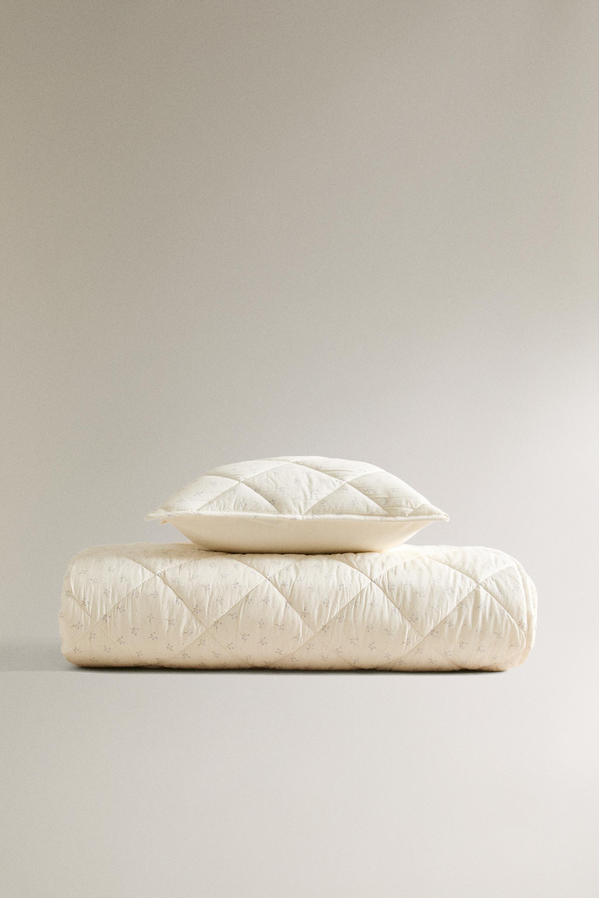 CHILDREN'S FLORAL PRINT QUILT