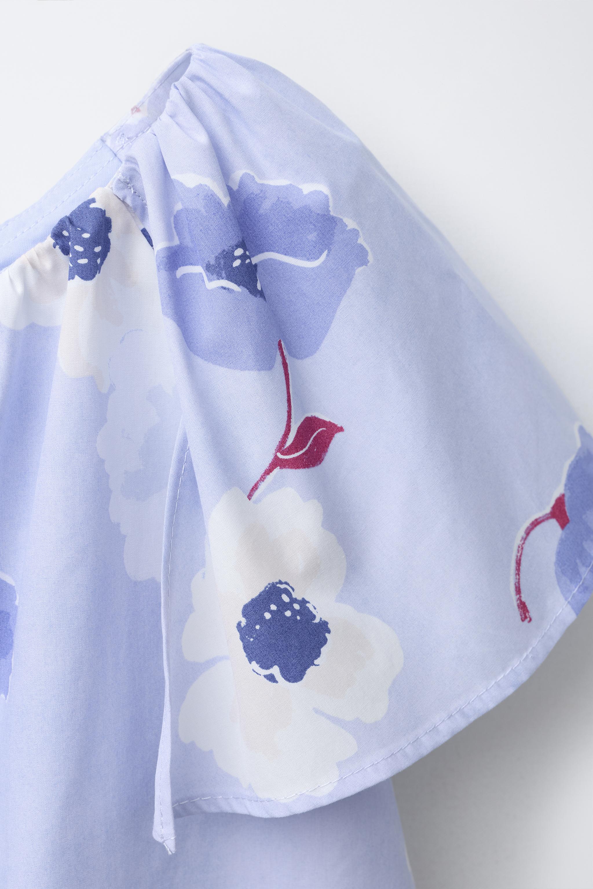 ASYMMETRIC FLORAL TOP