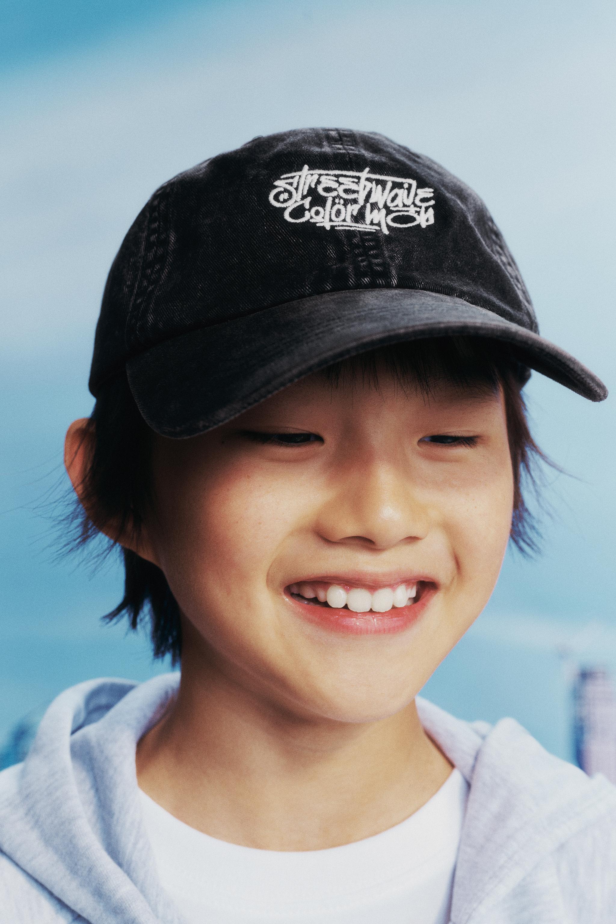 WASHED EFFECT EMBROIDERED TEXT CAP