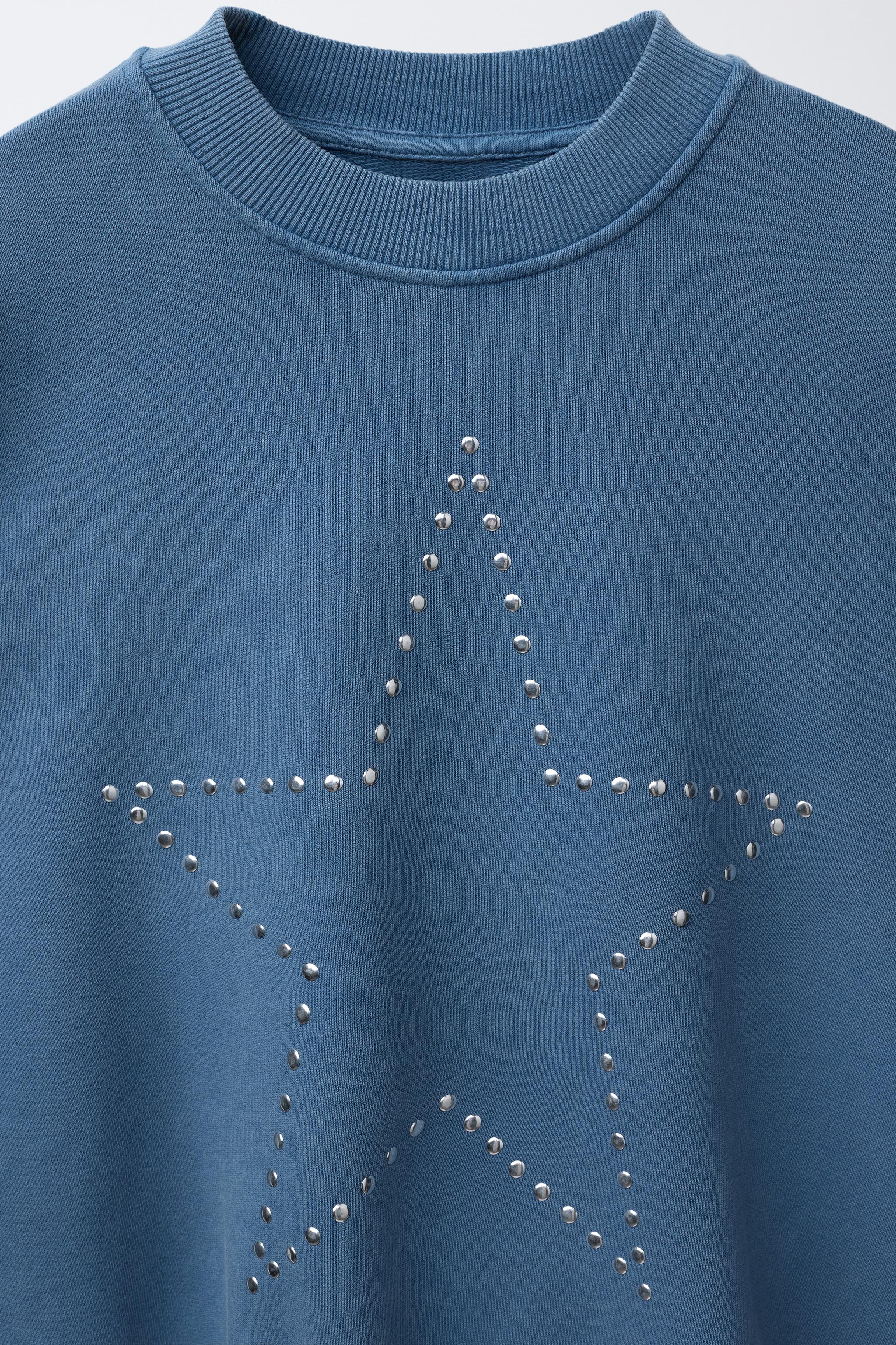 WASHED EFFECT STUDDED STAR SWEATSHIRT