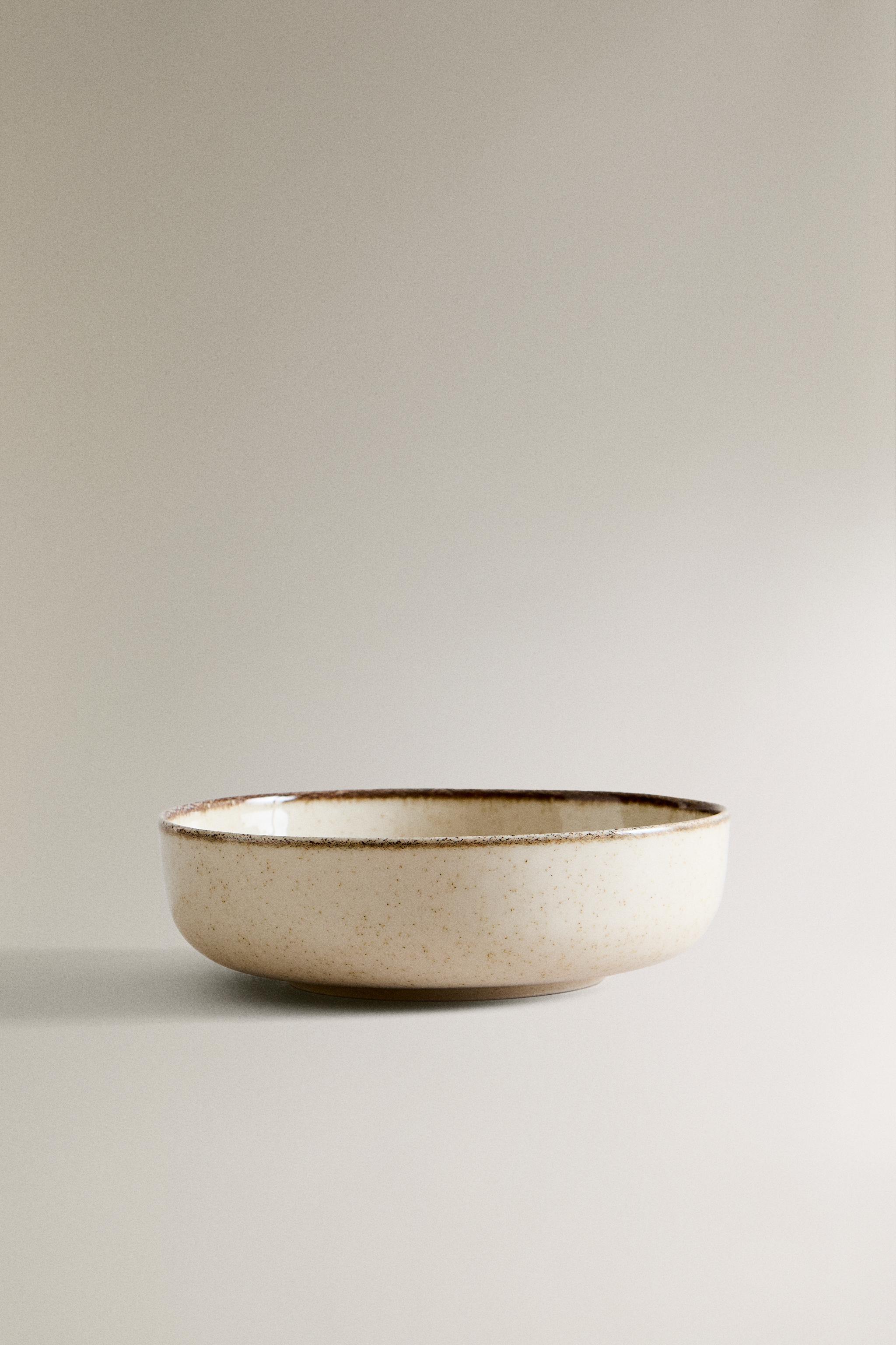 PORCELAIN BOWL WITH ANTIQUE FINISH RIM
