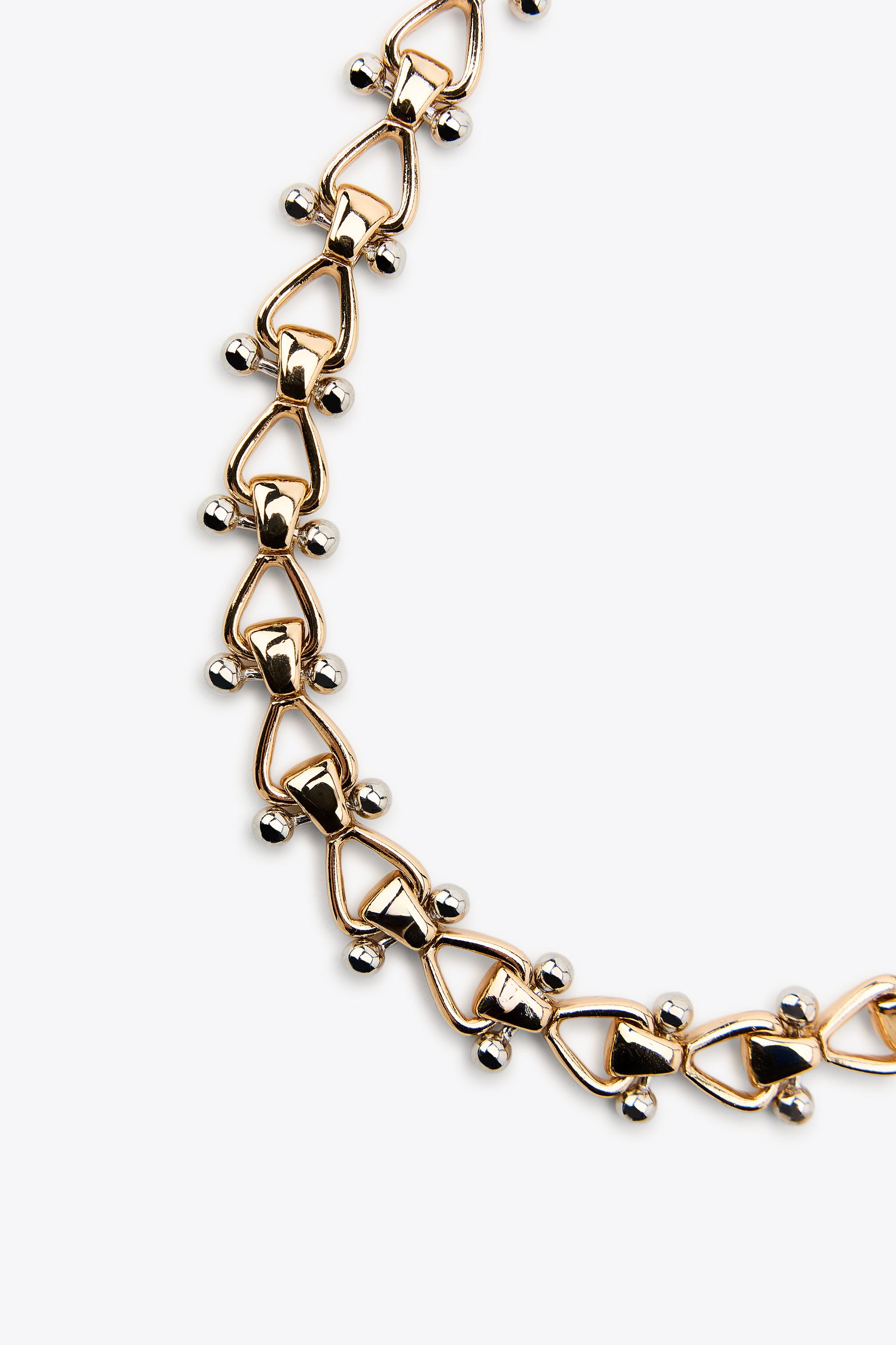 COMBINED METAL PIECE NECKLACE