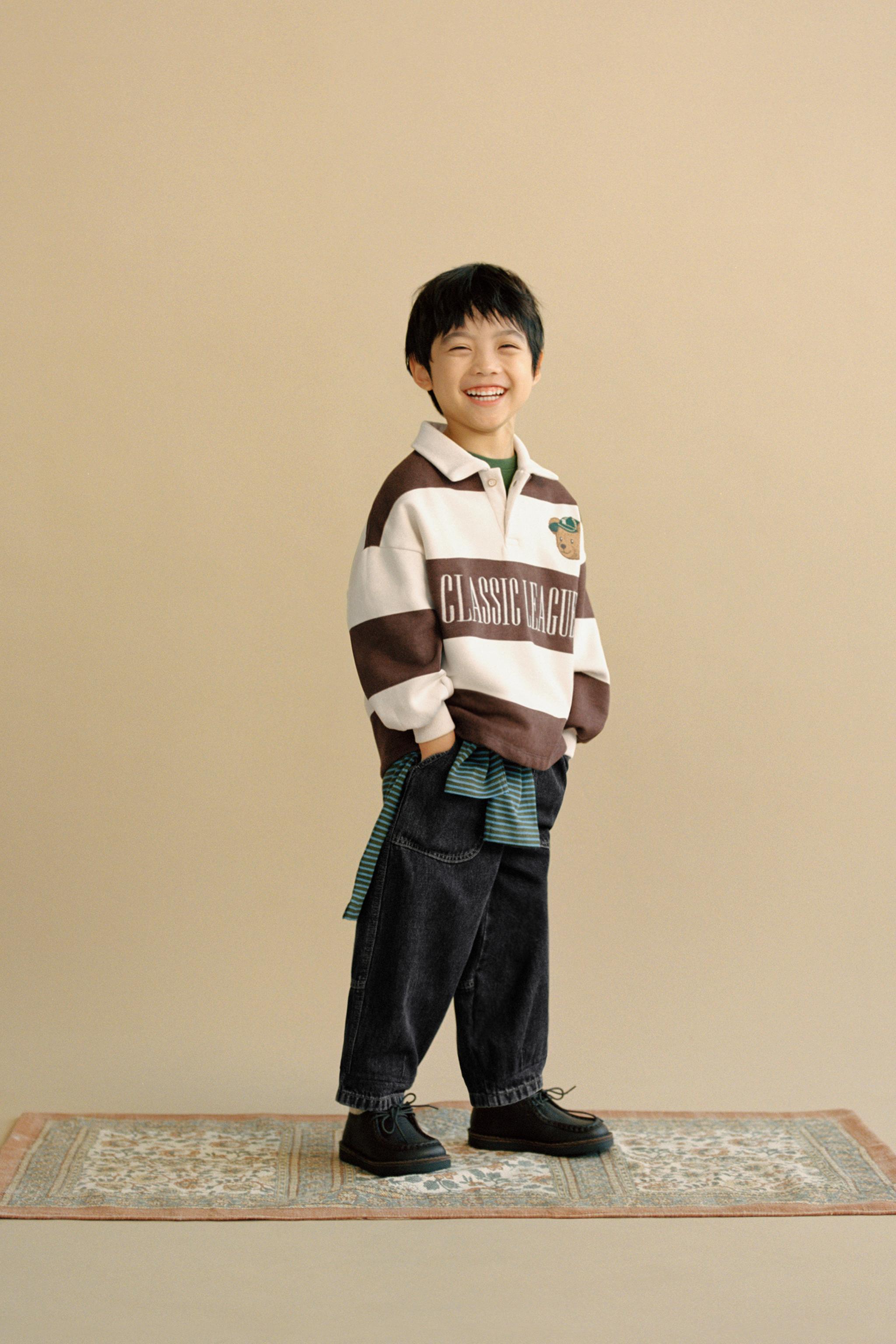 STRIPED POLO SHIRT WITH EMBROIDERED BEAR