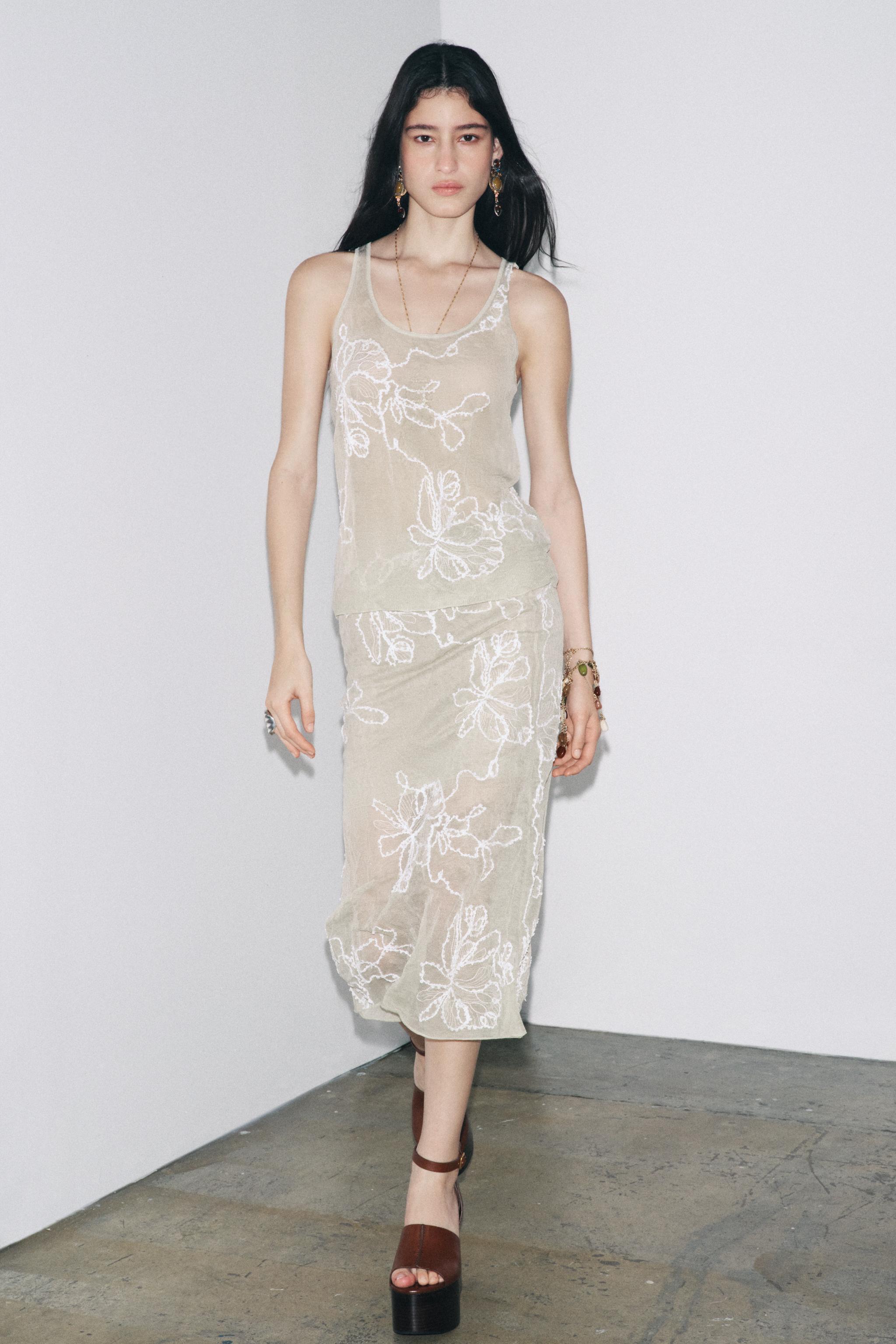 SEMI-SHEER STRUCTURED KNIT SKIRT