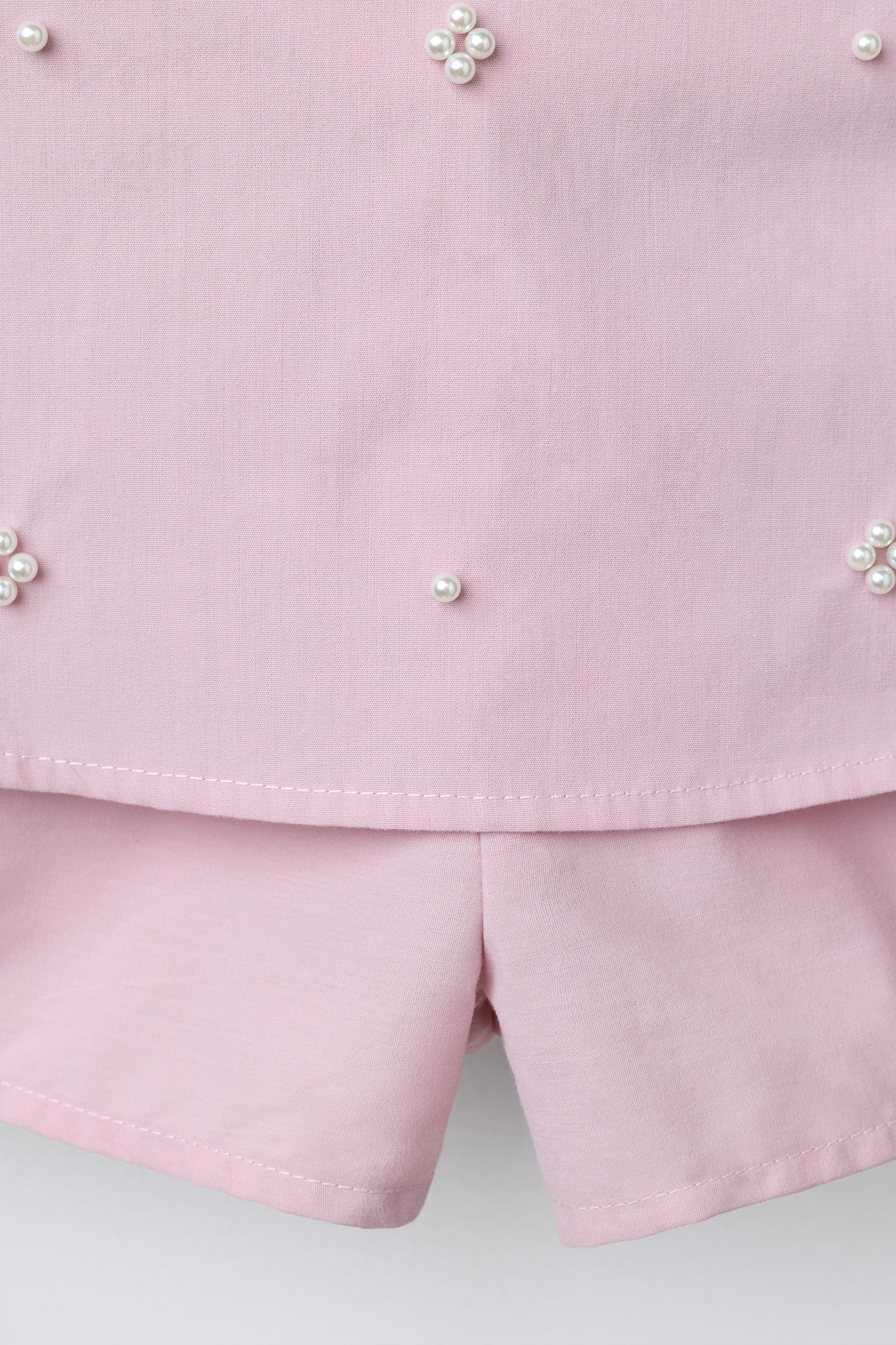 PEARL TRIM RUFFLED SKORT