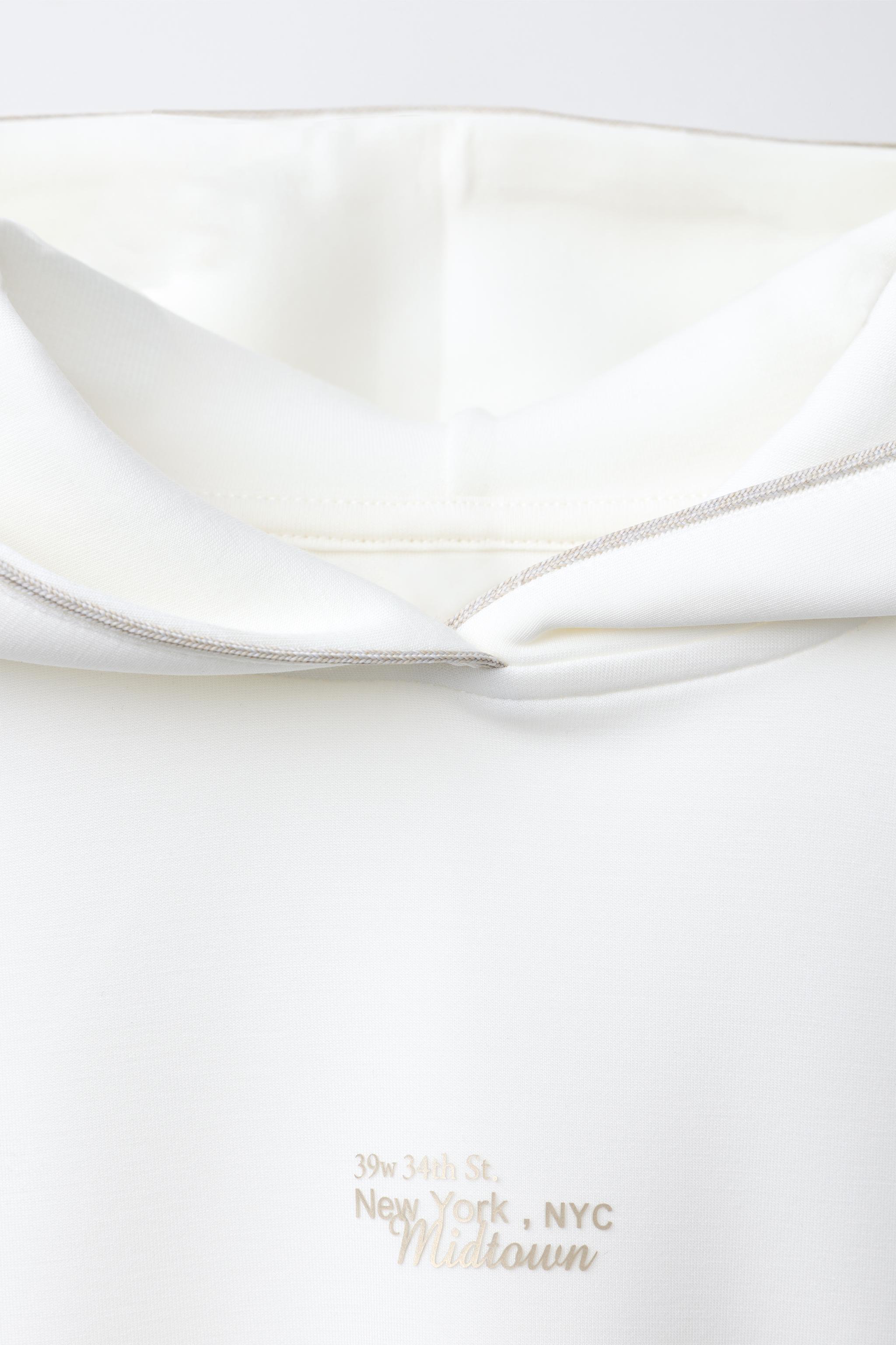 SWEATSHIRT WITH MODAL TEXT