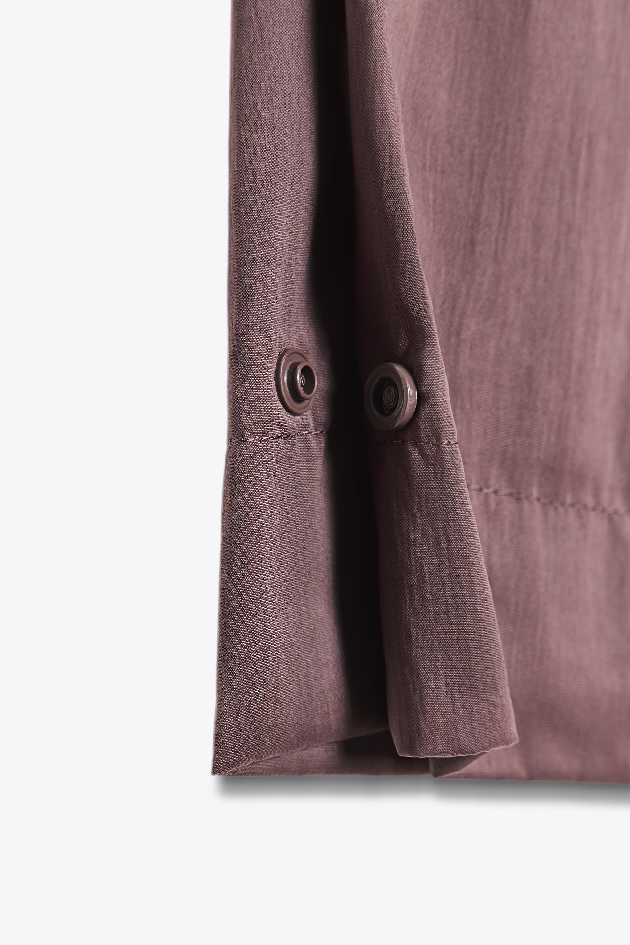 NYLON PANTS WITH BUTTON HEM