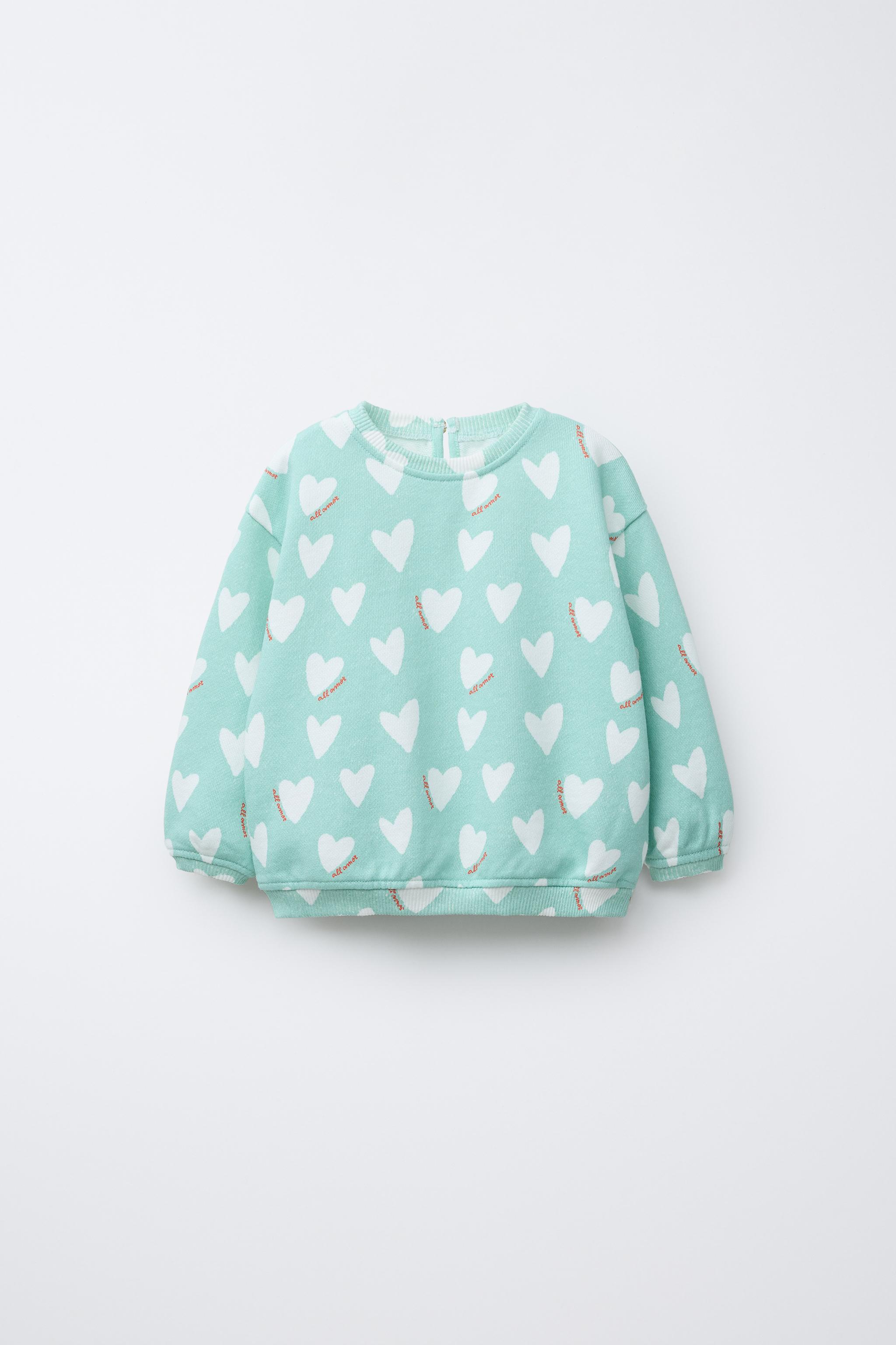 HEART PRINT SWEATSHIRT