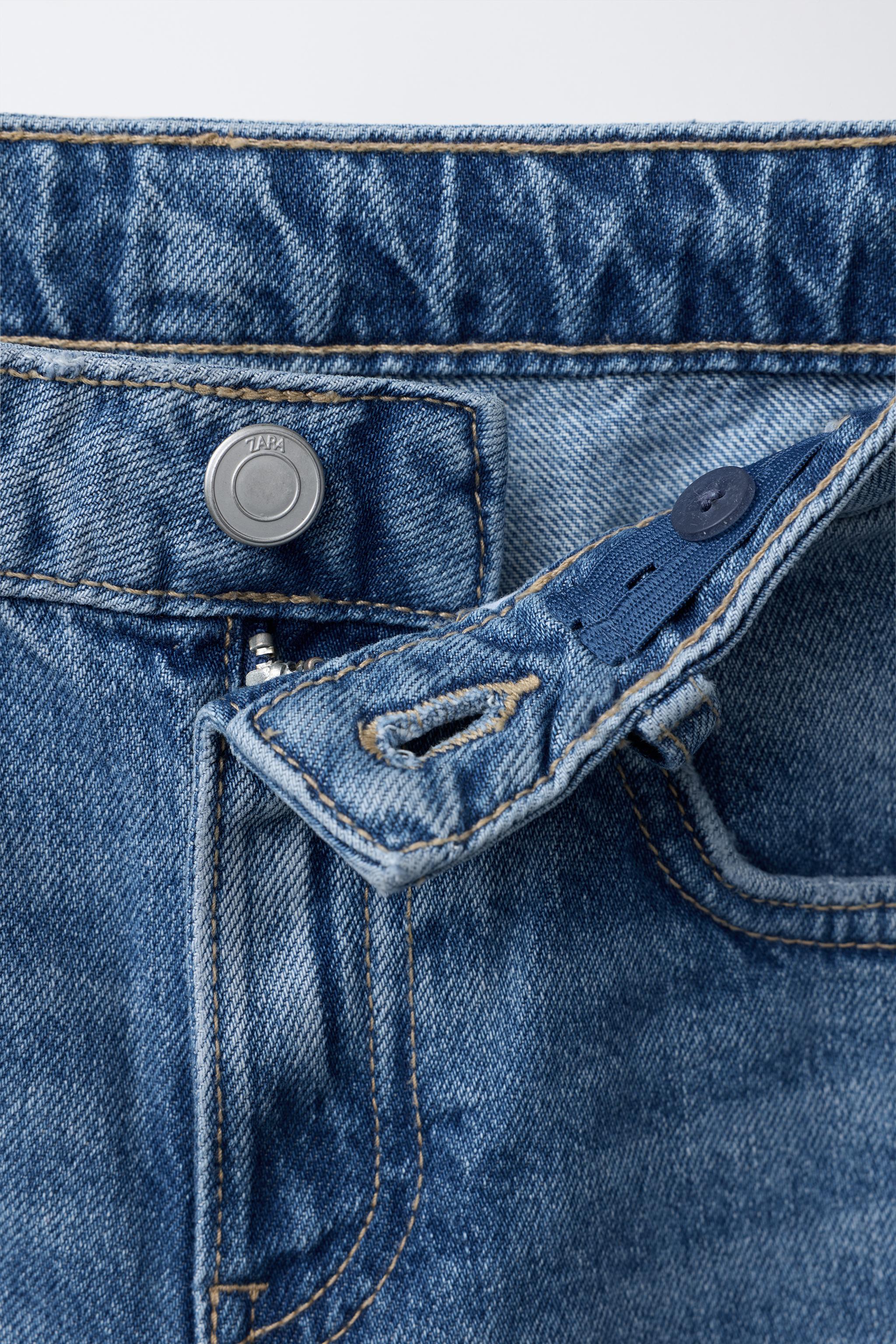 FRAYED BOOTCUT JEANS