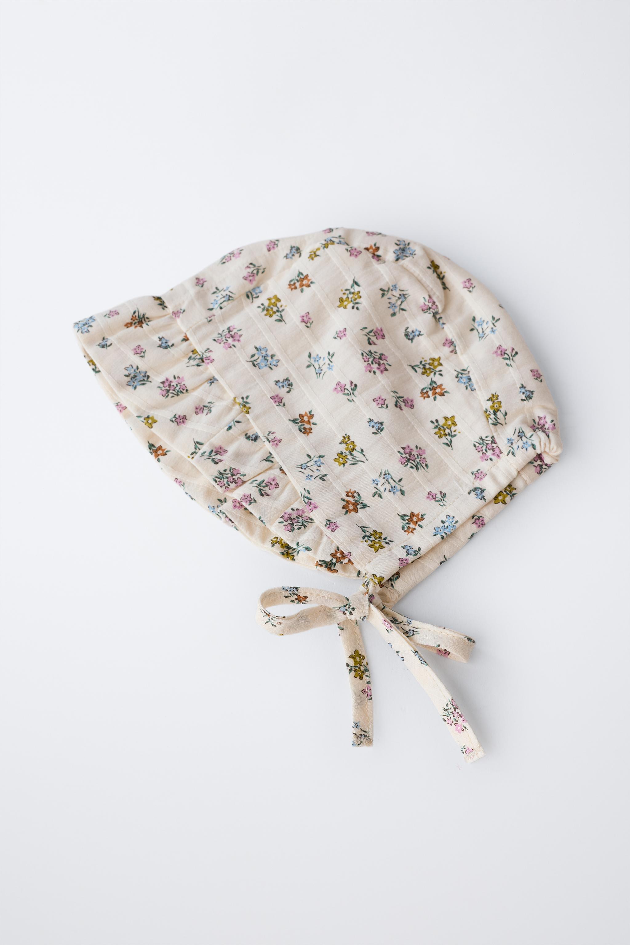 FLORAL TEXTURED RUFFLED BONNET