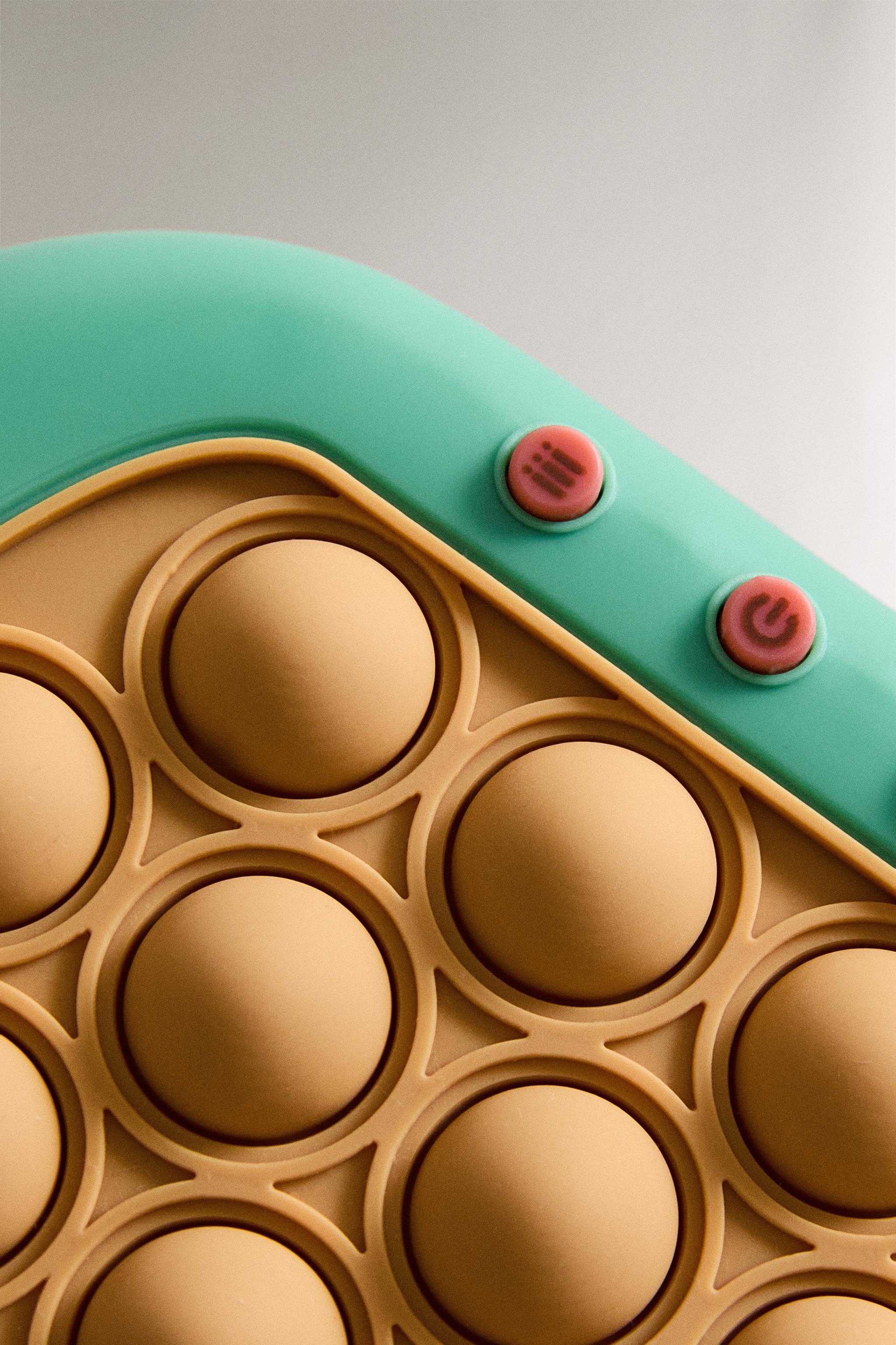 CHILDREN'S ELECTRONIC POP IT TOY