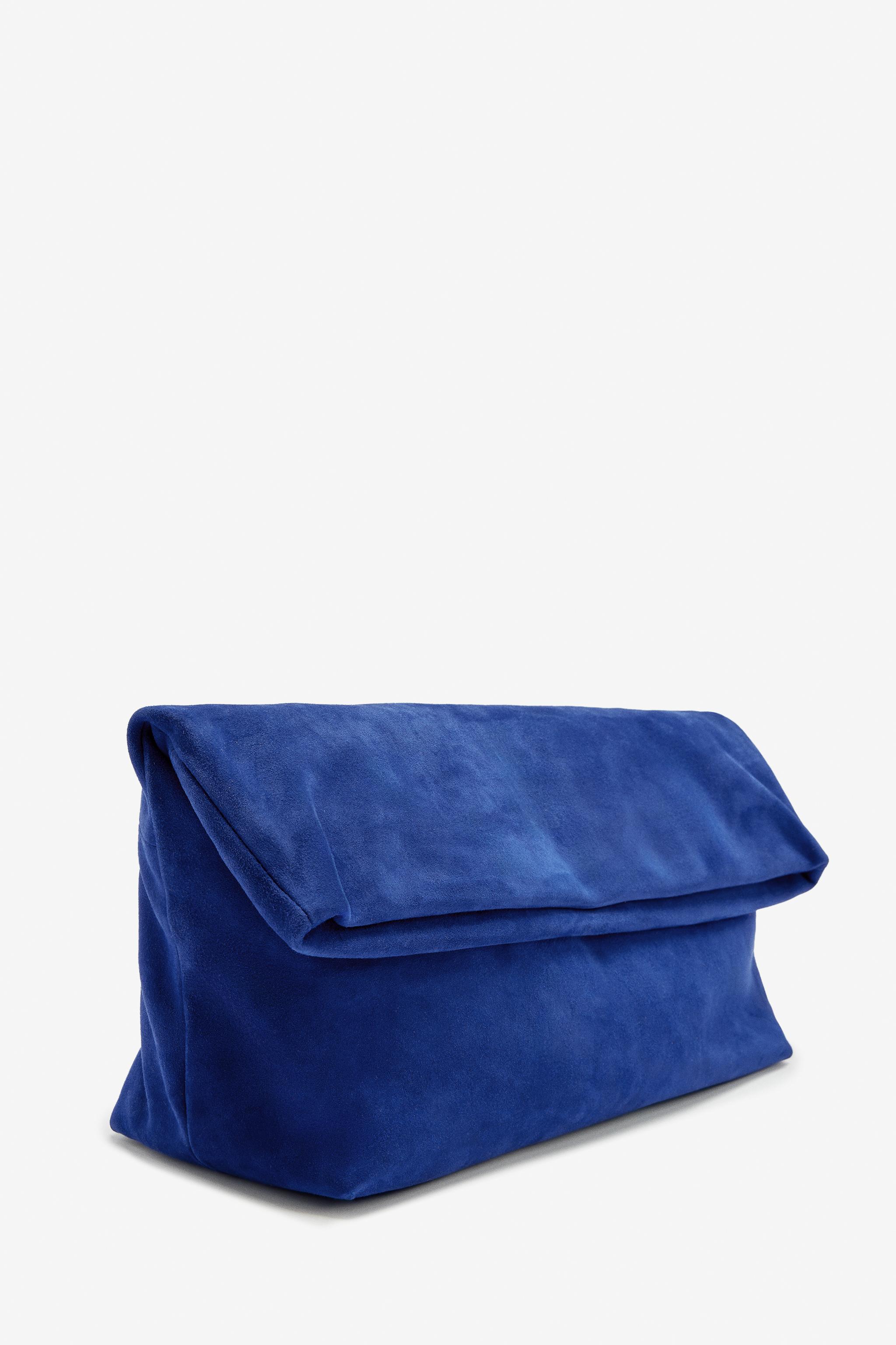 LIMITED EDITION MAXI SUEDE CLUTCH