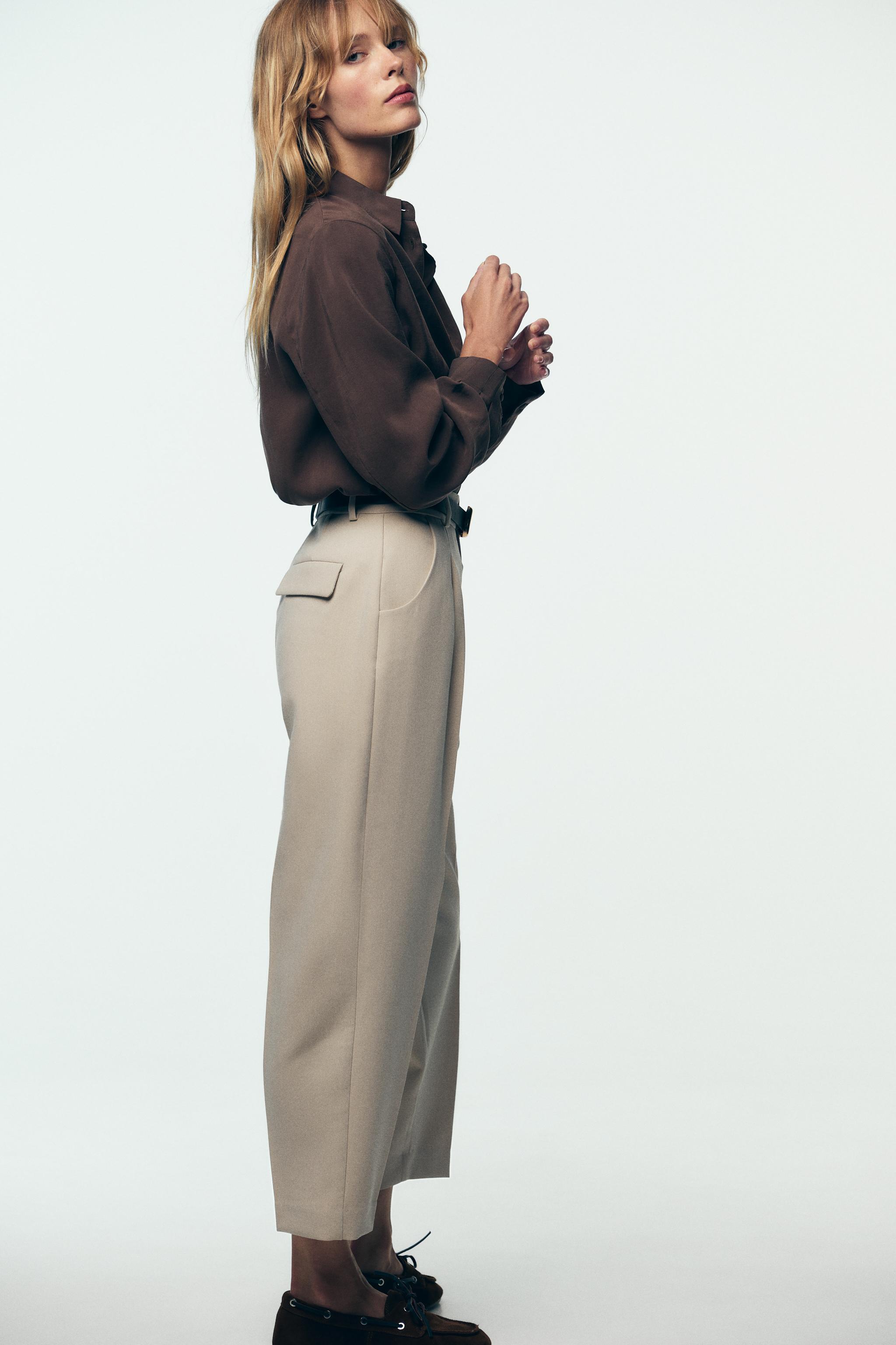 BELTED PLEATED PANTS